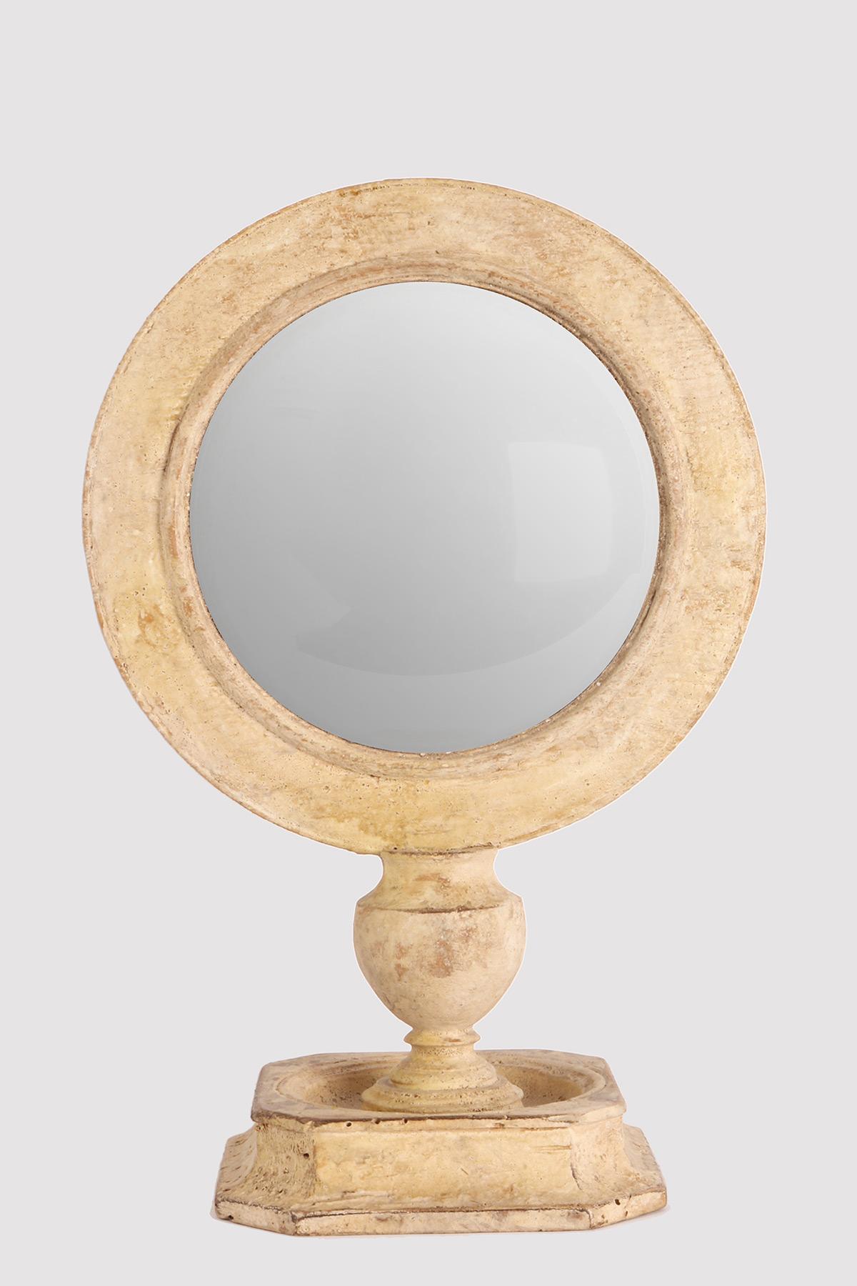 A Wunderkammer round convex mirror with white wooden frames mounted over a white wooden square base on the rear of the frame there is one round paesina stone. Italy, 1870 ca.