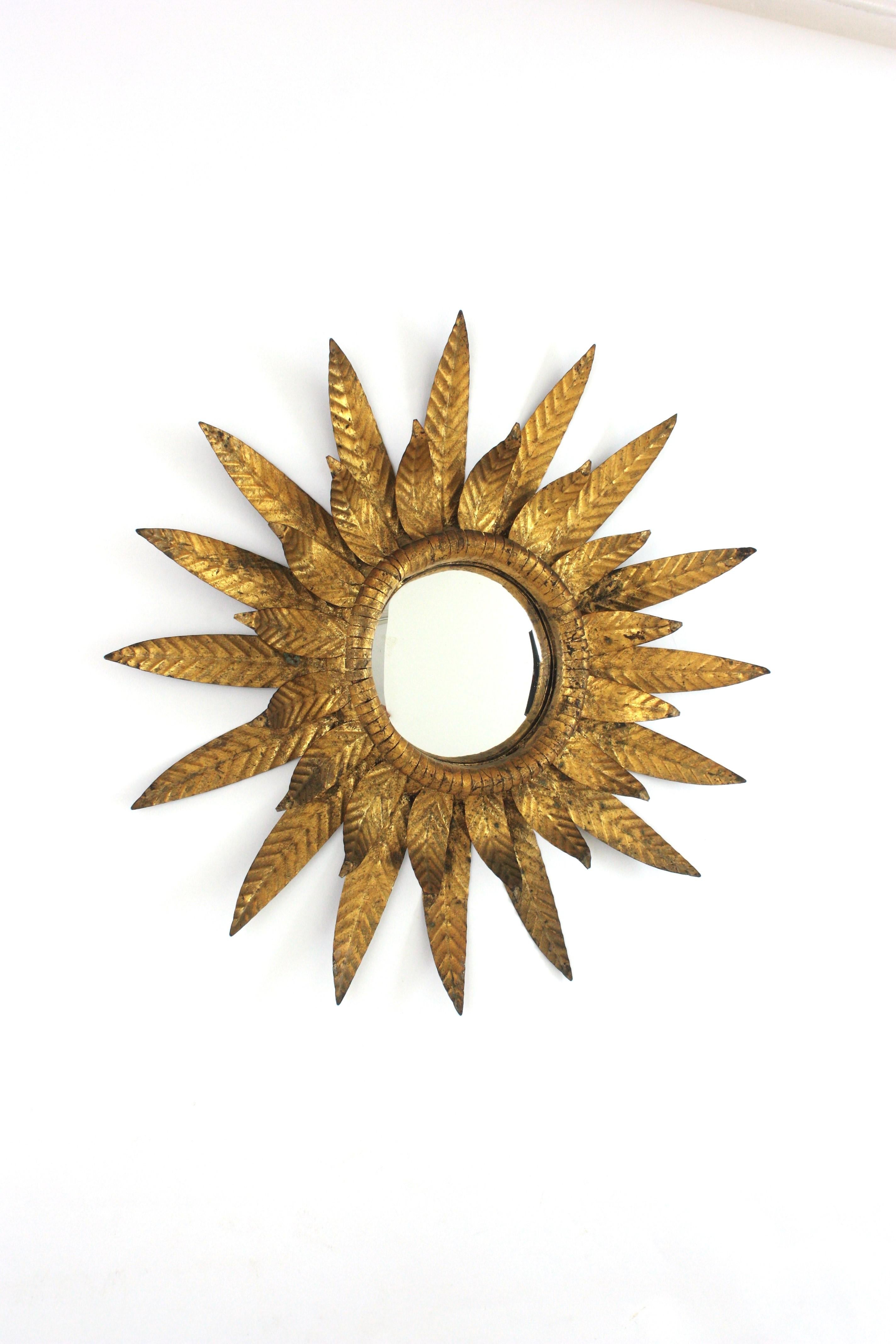 Mid-Century Modern Convex Sunburst Mirror in Gilt Metal, Double Layered Leafed Frame, Spain 1950s For Sale