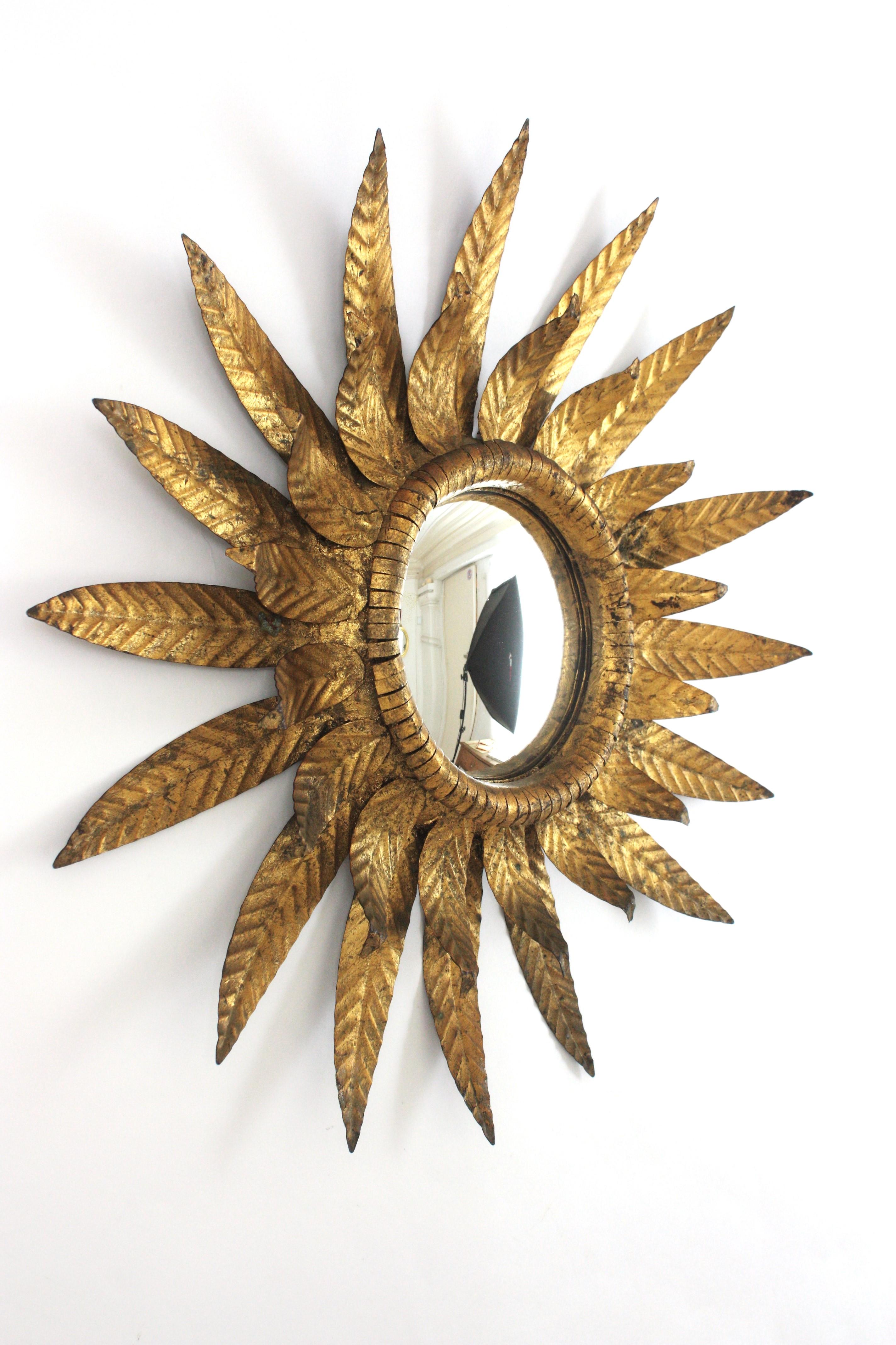 20th Century Convex Sunburst Mirror in Gilt Metal, Double Layered Leafed Frame, Spain 1950s For Sale
