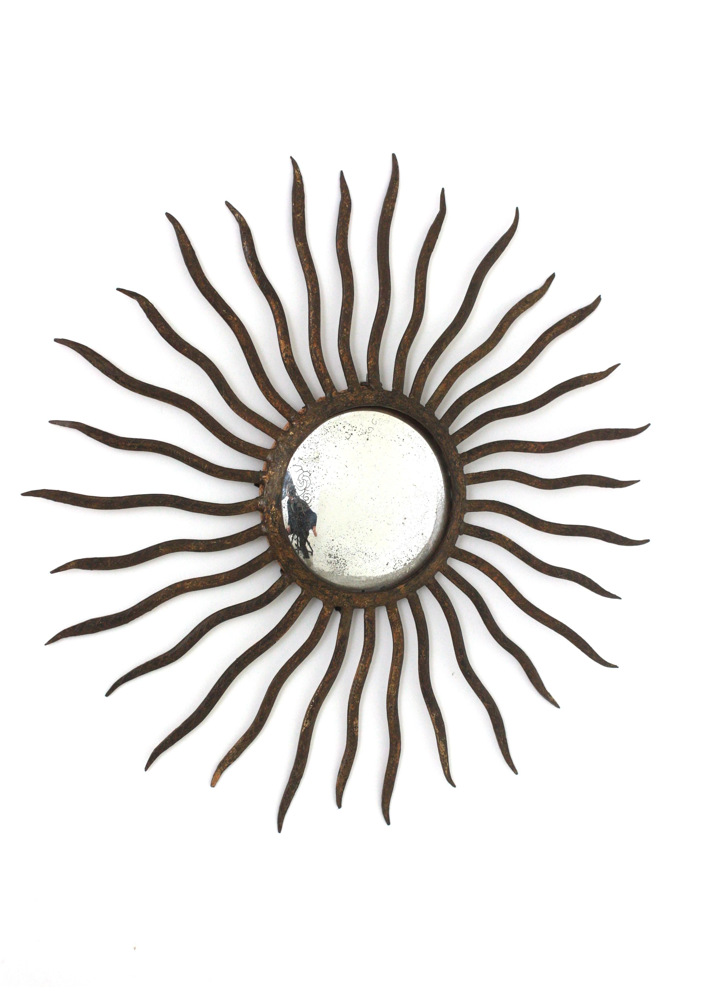 Brutalist Convex Sunburst Mirror in the Style of Gilbert Poillerat, Parcel Gilt Iron, 40s For Sale