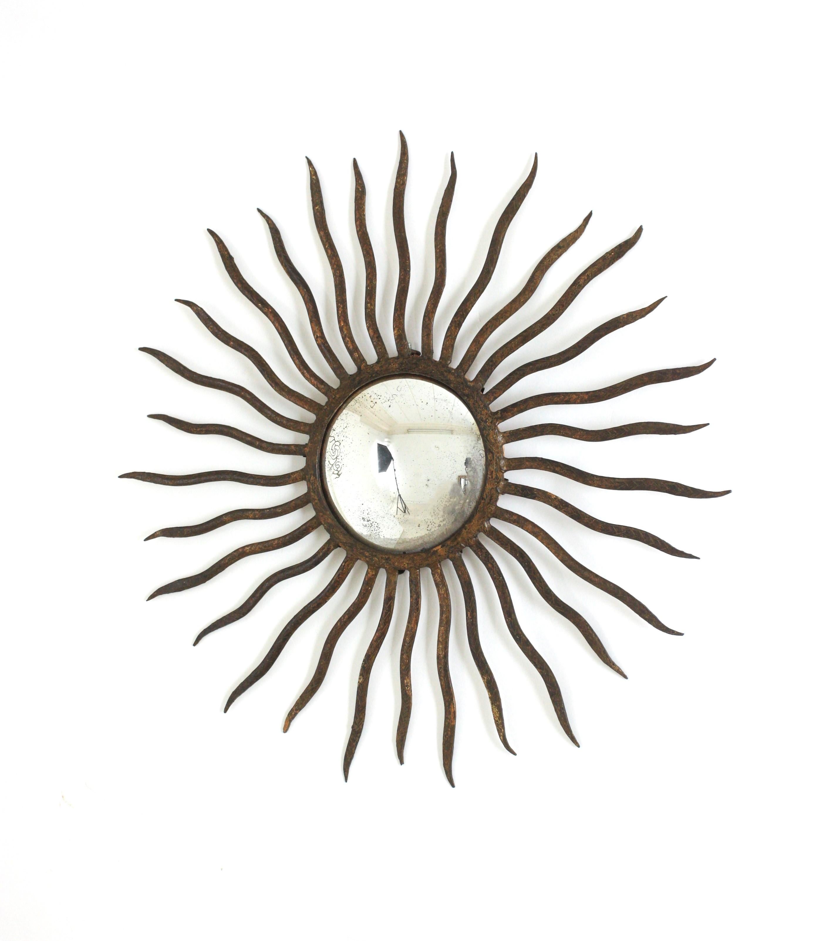Metal Convex Sunburst Mirror in the Style of Gilbert Poillerat, Parcel Gilt Iron, 40s For Sale