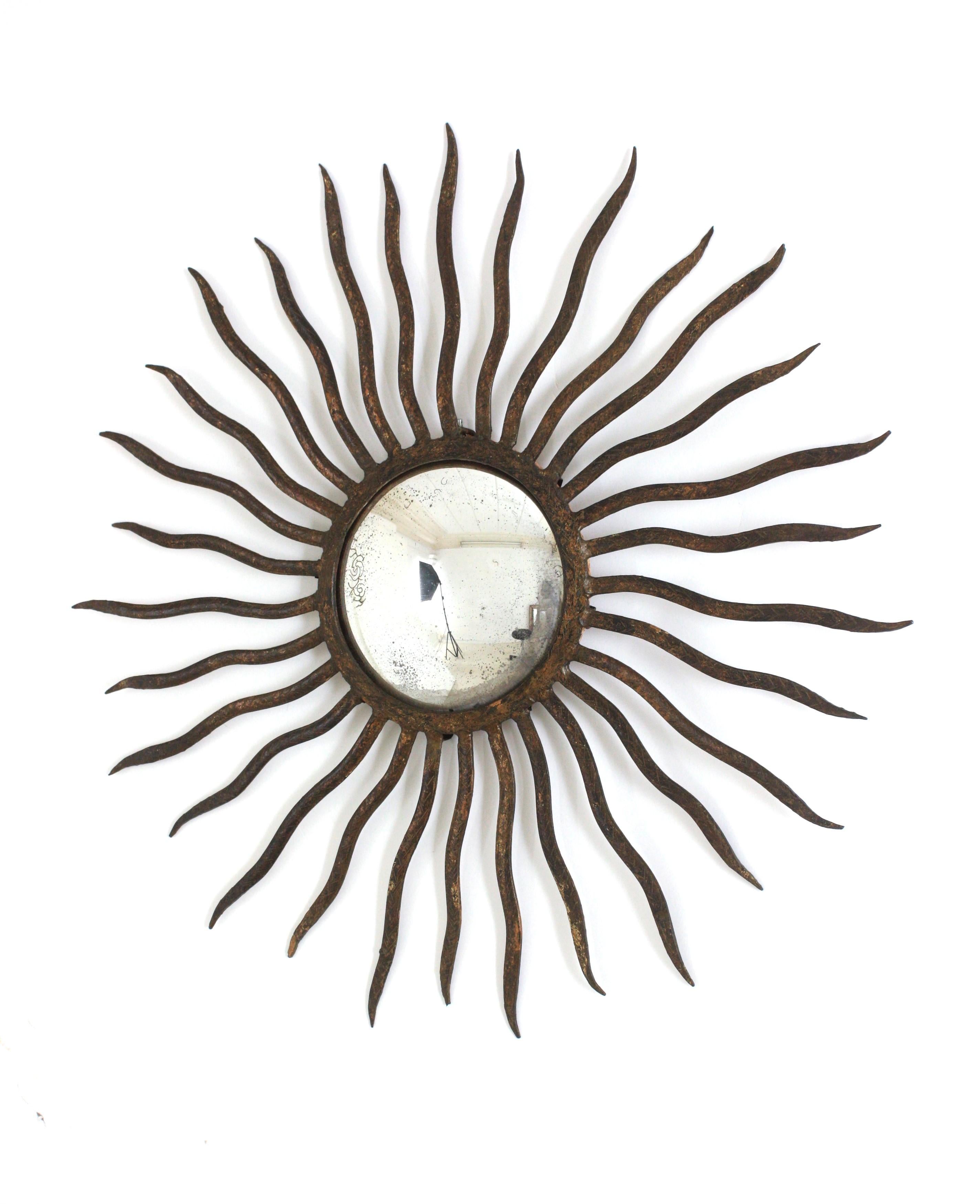Convex Sunburst Mirror in the Style of Gilbert Poillerat, Parcel Gilt Iron, 40s For Sale 1