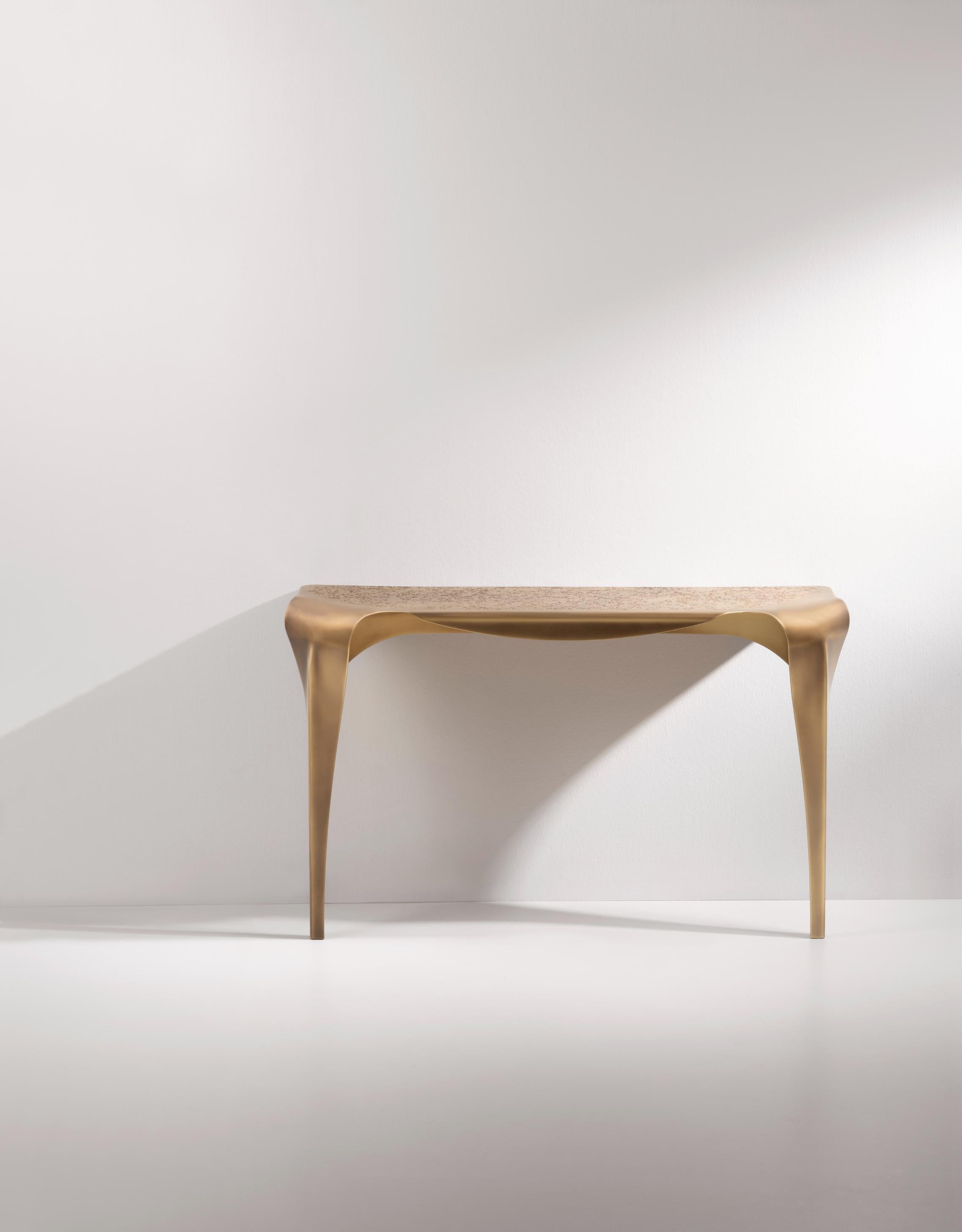 Convivium Console by De Castelli
Dimensions: W 140 x D 43 x H 85 cm
Materials: DeErosion Brass
Other versions are available. Please contact us for any requests.

Inspired by the table of the same name, Convivium console leans against the wall with