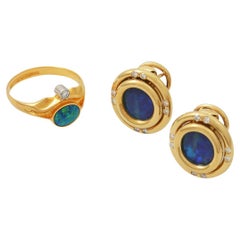 Convolut opal jewelry consisting of earrings and Lapponia ring,