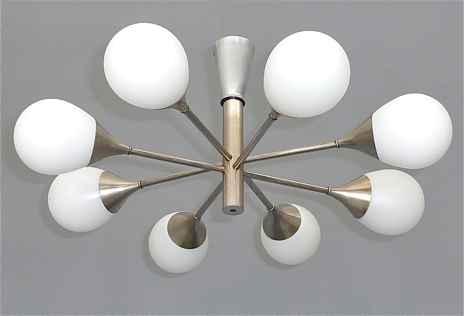 Cool 8 light Flush Mount sputnik chandelier, in the style of Angelo Lelii for Arredoluce and Stilnovo, designed and manufactured by the famous German lighting company Kaiser Leuchten, Germany around 1960s, which is well-known for the artist