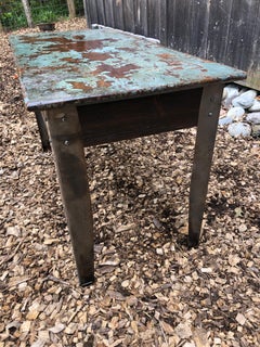 Cool Industrial Distressed Wood Table with Metal Legs