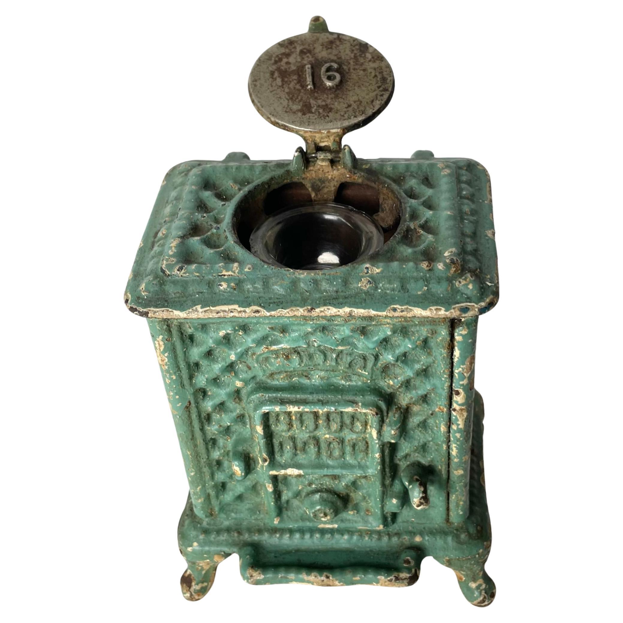 Cool Ink Well designed as a Godin iron stove from the late 19th Century For Sale