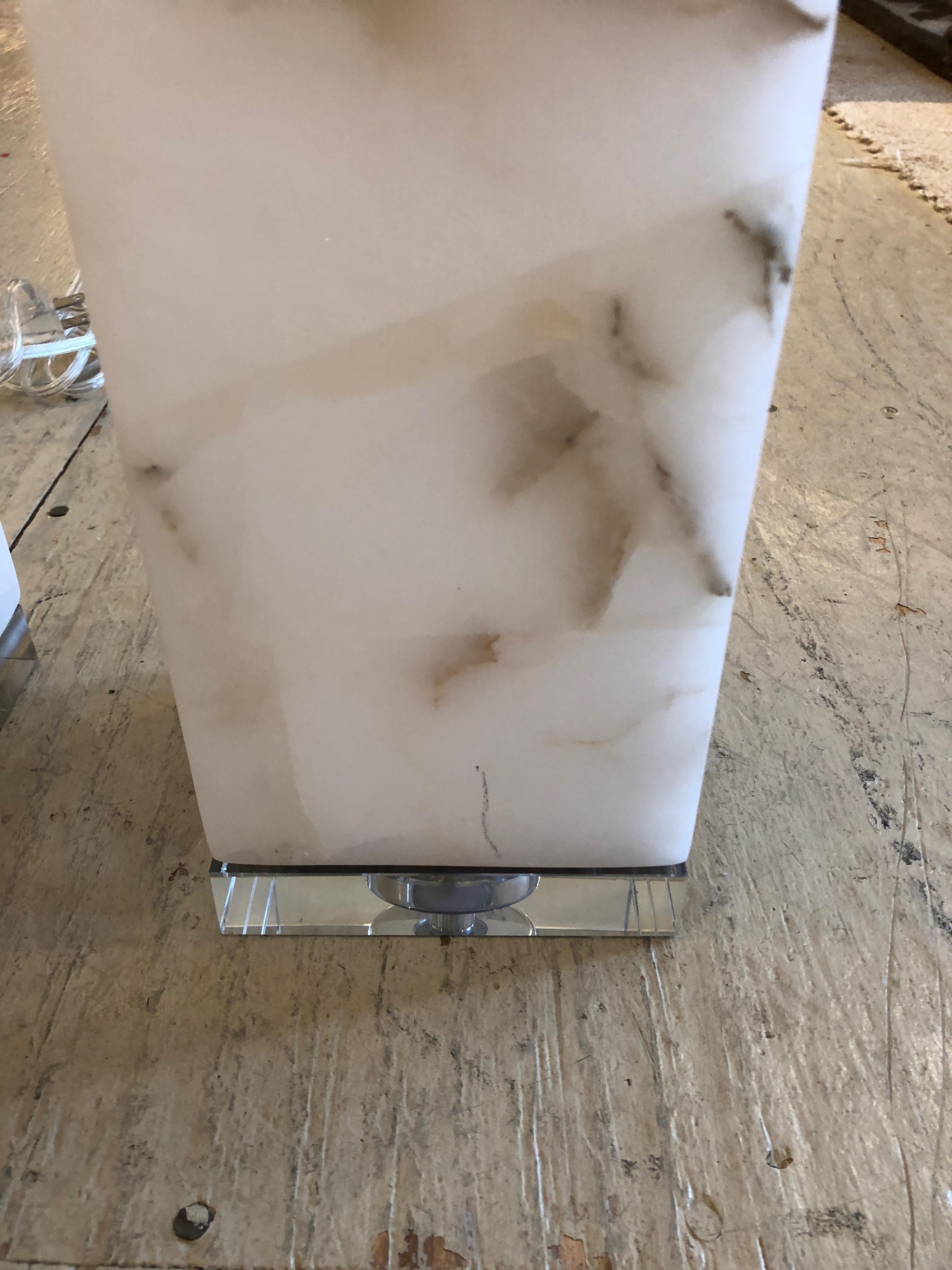 Chic pair of marble and Lucite columnar cube shaped table lamps.