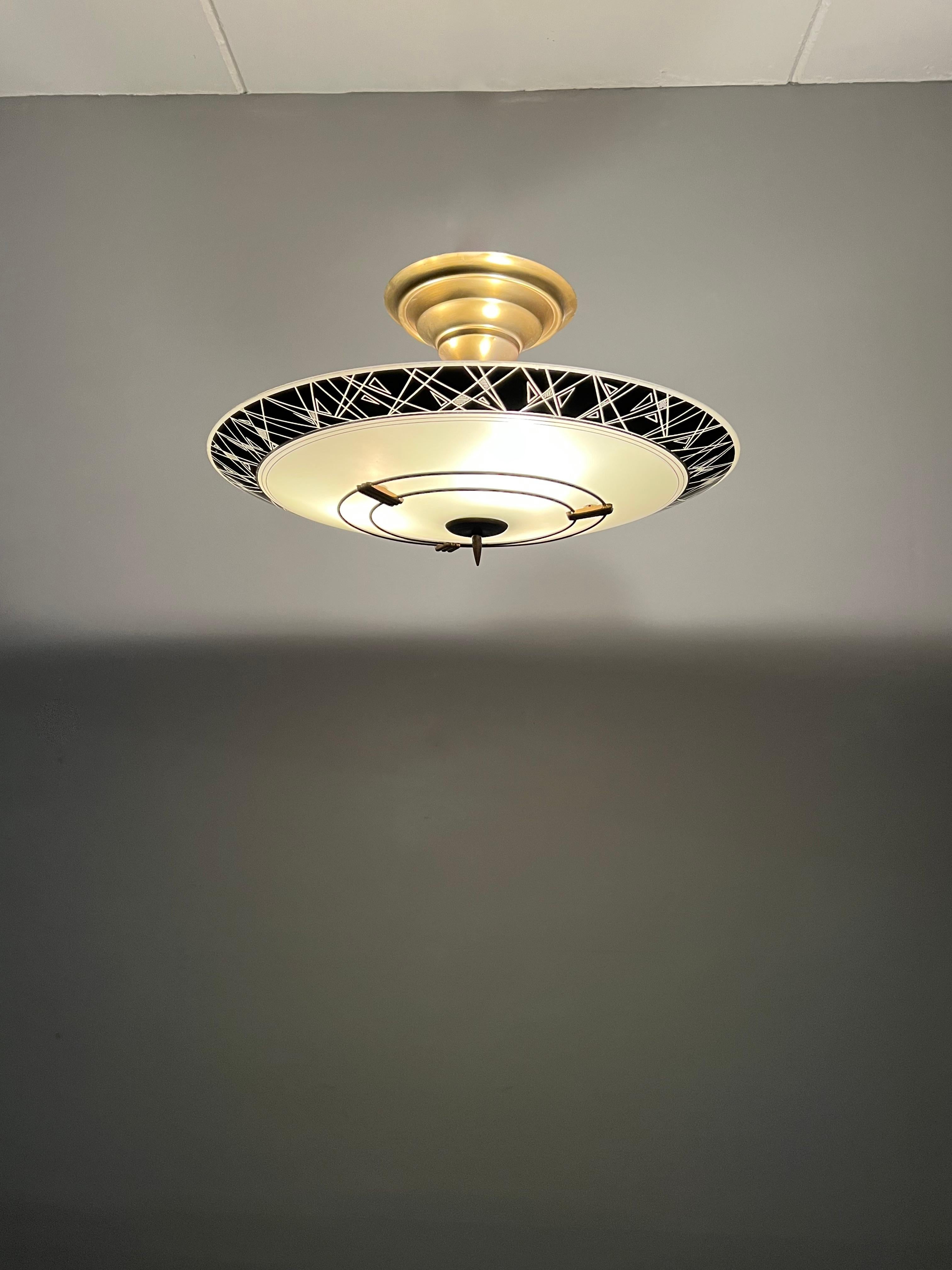 European Cool Mid-Century Modern Jazzy Black Glass and Brass Flush Mount W. Golden Lining For Sale