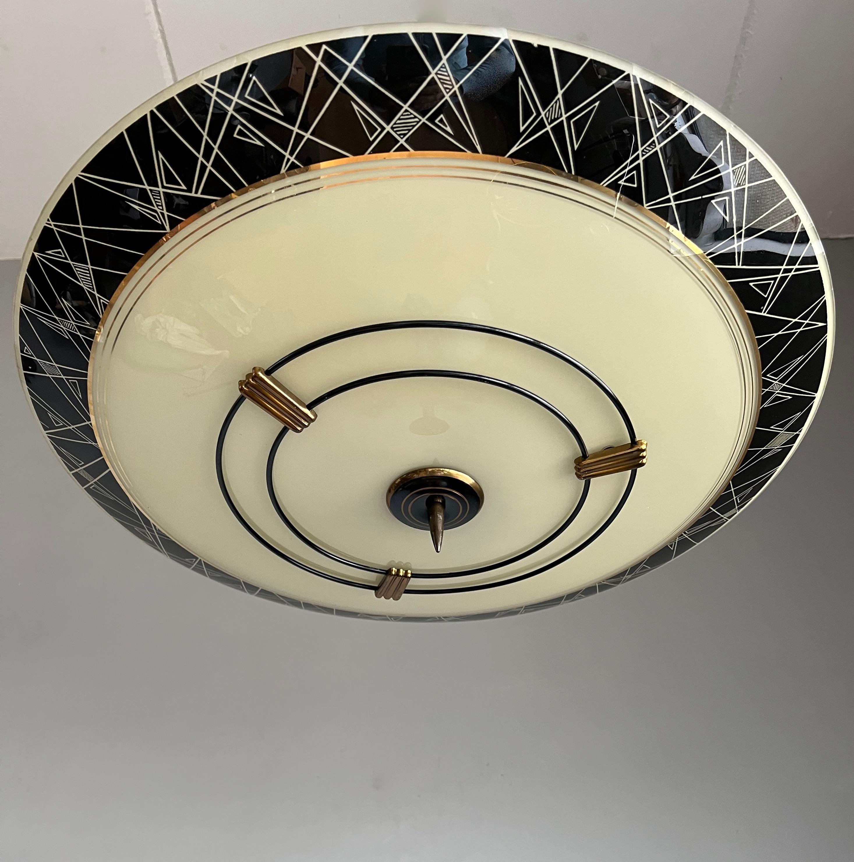 Cool Mid-Century Modern Jazzy Black Glass and Brass Flush Mount W. Golden Lining In Good Condition For Sale In Lisse, NL