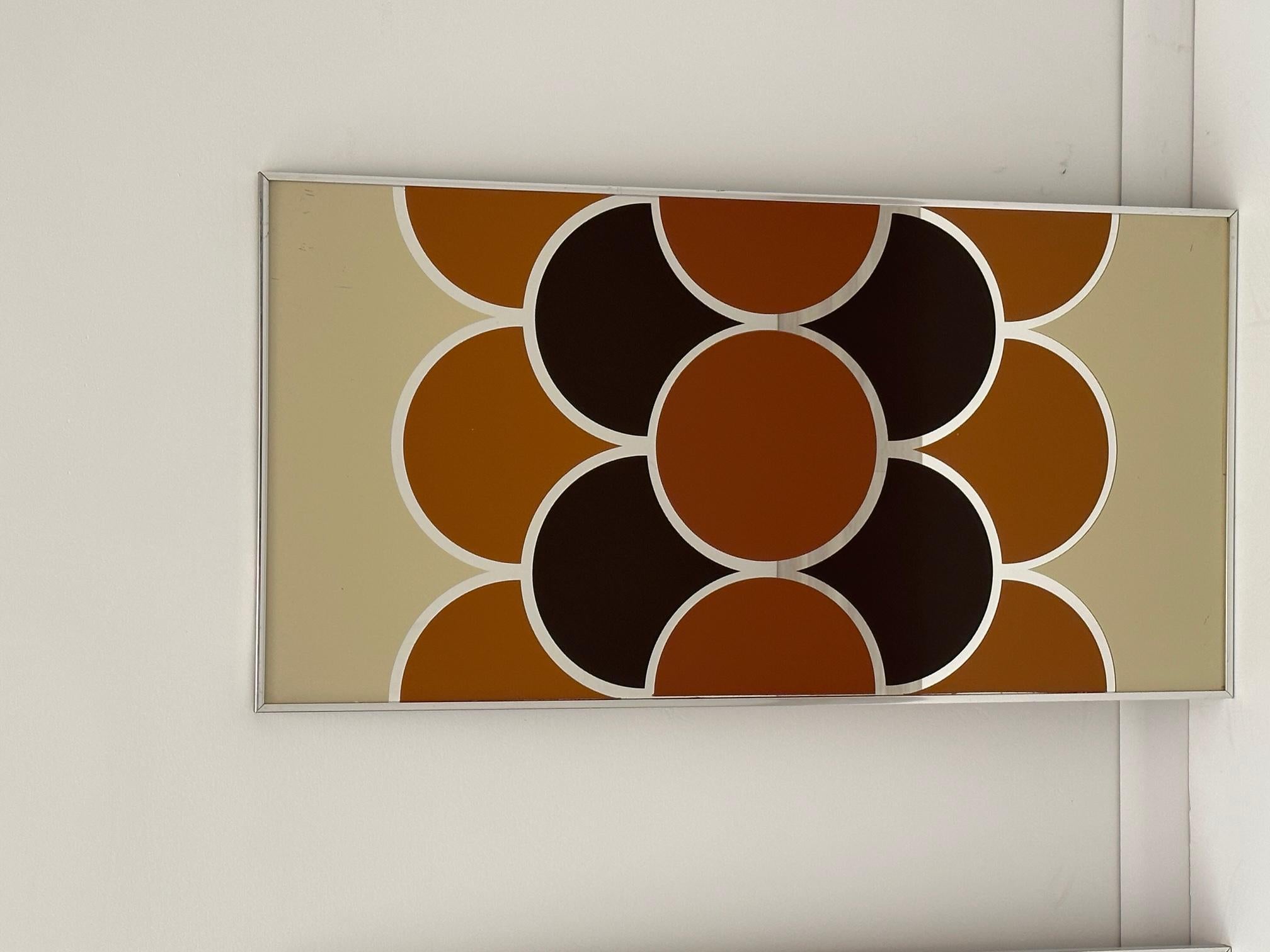 Fun mod pair of stylish mid-century panels having graphic design that's a combination of mirror and brown, black and silver graphics. Titled 