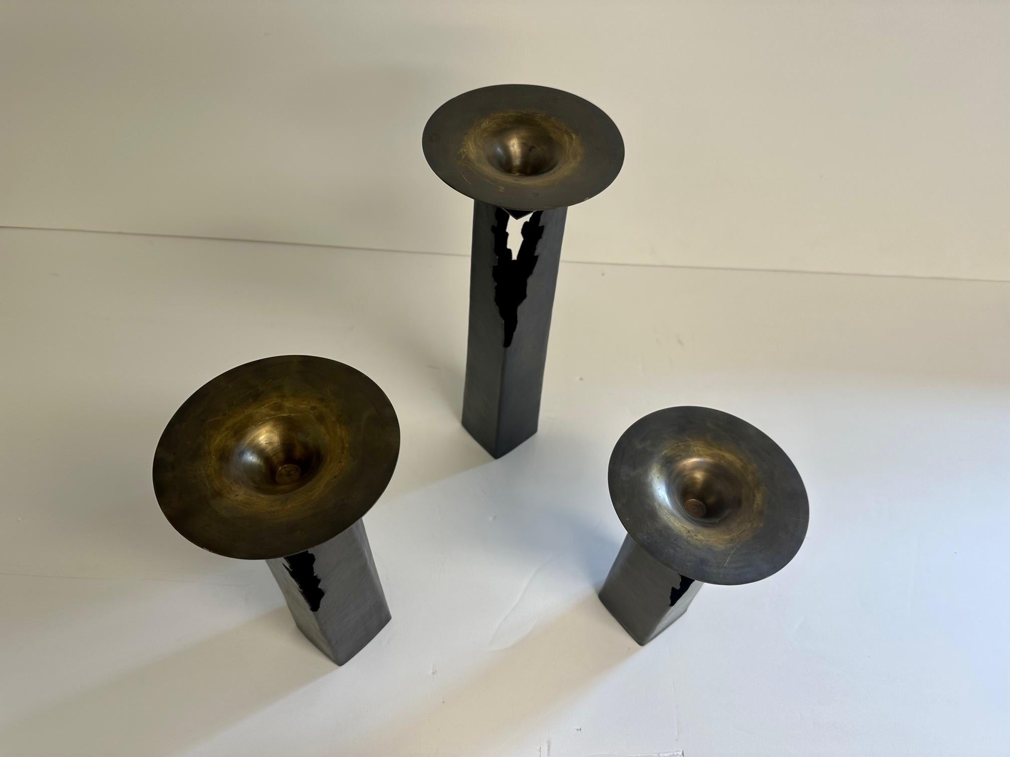 Cool Set of Graduated Patinated Pierced Copper and Brass Candlesticks For Sale 1