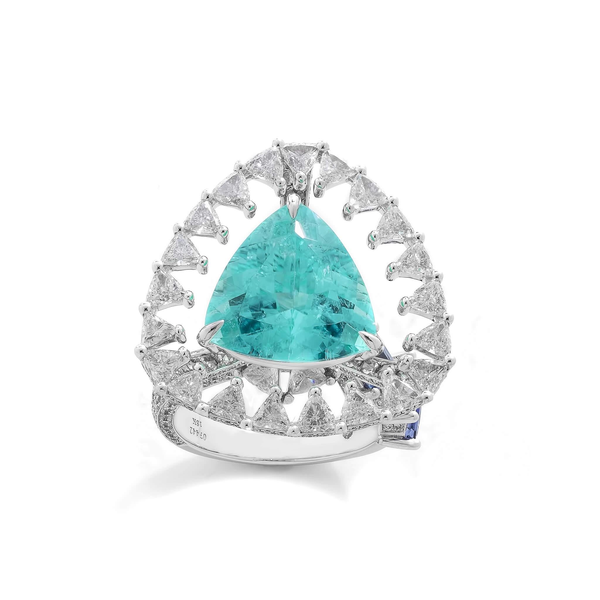 Coomi Trinity collection 18K white gold cocktail ring with 7.77cts floating paraiba, 3.90cts diamond, and 1.36cts blue sapphire.