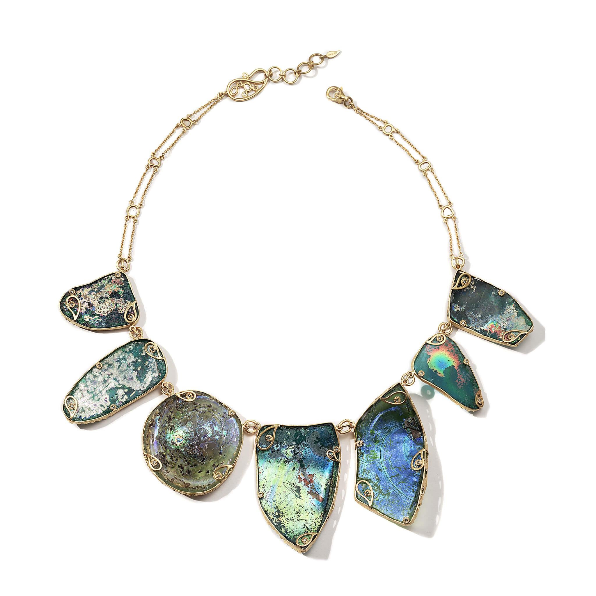 Coomi ancient Roman glass necklace set in 20K yellow gold with 3.25cts diamonds.

Coomi presents her latest addition to the Antiquity collection, Ancient Roman Glass. Each slice of the world’s first handblown glass, dating back to the 1st century