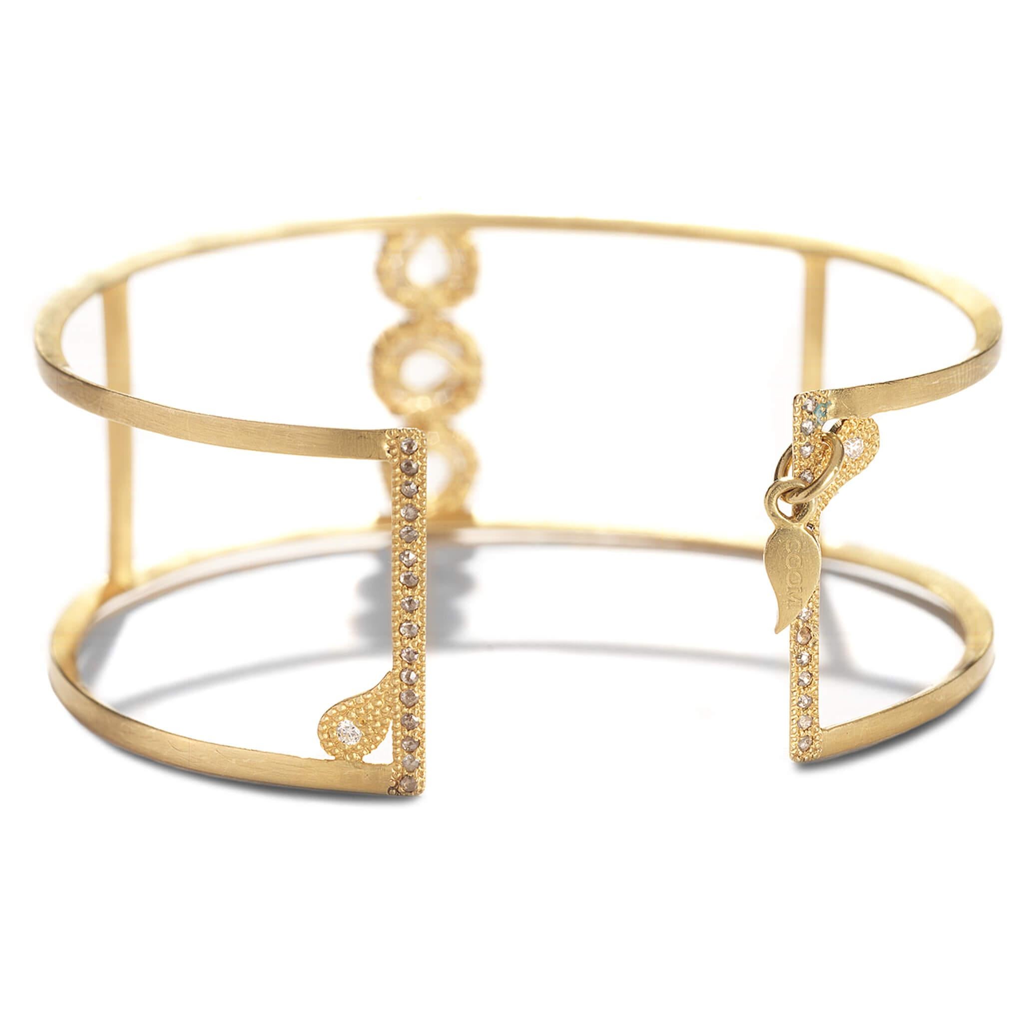 Coomi Luminosity cuff bracelet set in 20K yellow gold with 1.41cts diamonds.

Coomi’s Luminosity Collection consists of bold design and reflects light from within. Each uniquely natural rose cut diamond and diamond slice are chosen by Coomi for the