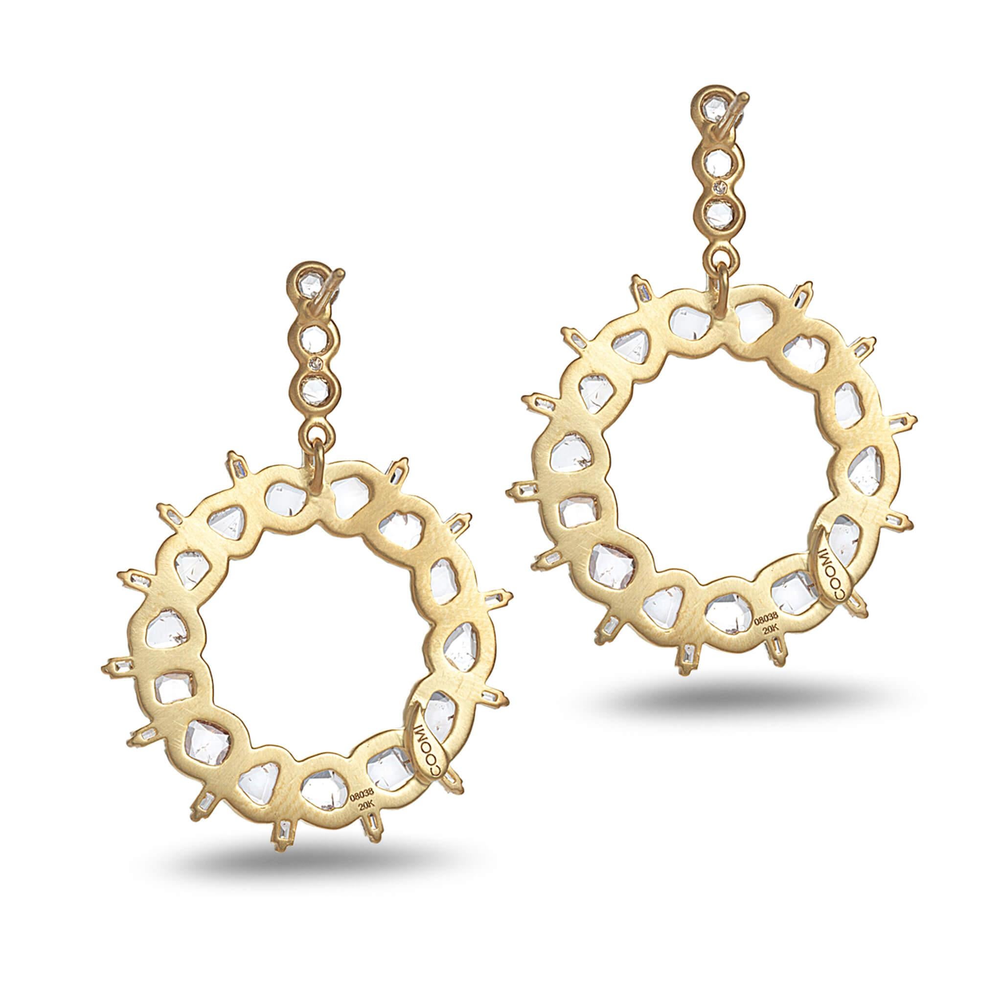 Coomi Luminosity front facing hoop earrings set in 20K yellow gold with 2.90cts diamonds.

Coomi’s Luminosity Collection consists of bold design and reflects light from within. Each uniquely natural rose cut diamond and diamond slice are chosen by