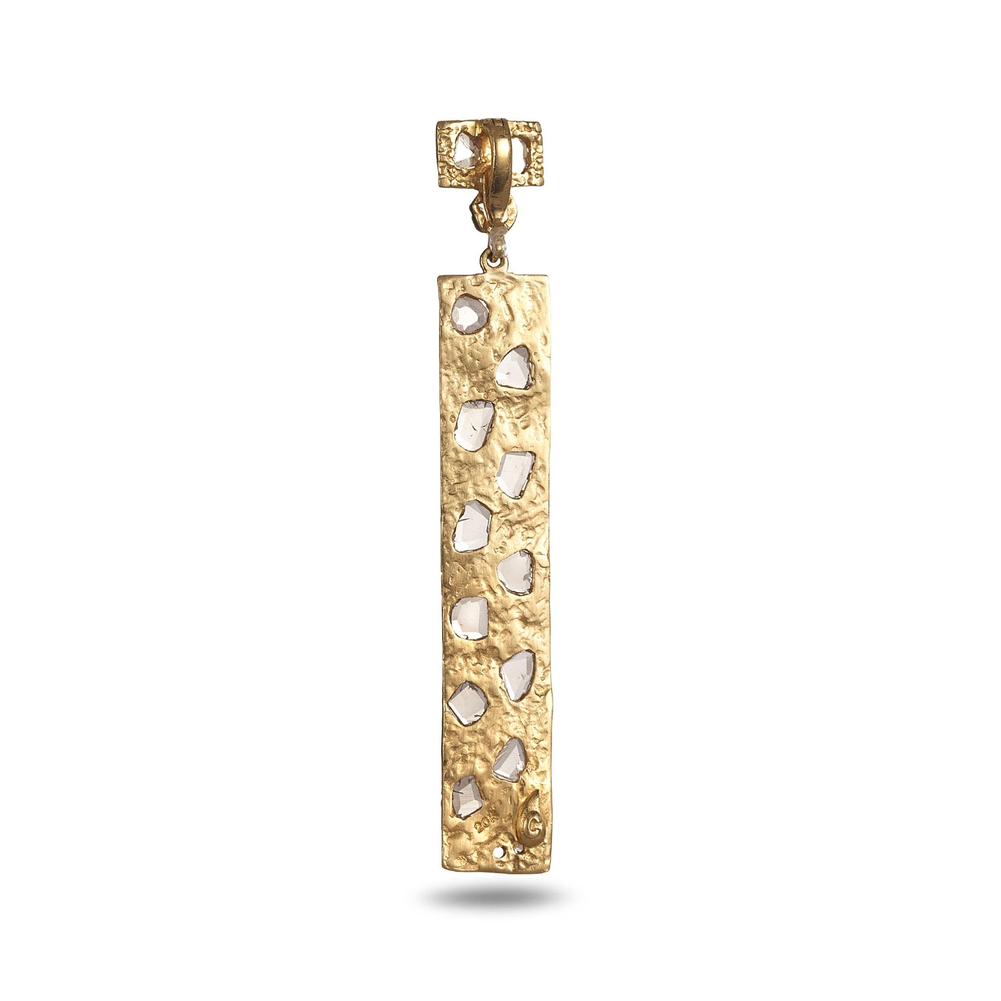 Coomi Luminosity pendant set in 20K yellow gold with 0.79cts diamonds.

Coomi’s Luminosity Collection consists of bold design and reflects light from within. Each uniquely natural rose cut diamond and diamond slice are chosen by Coomi for the pieces