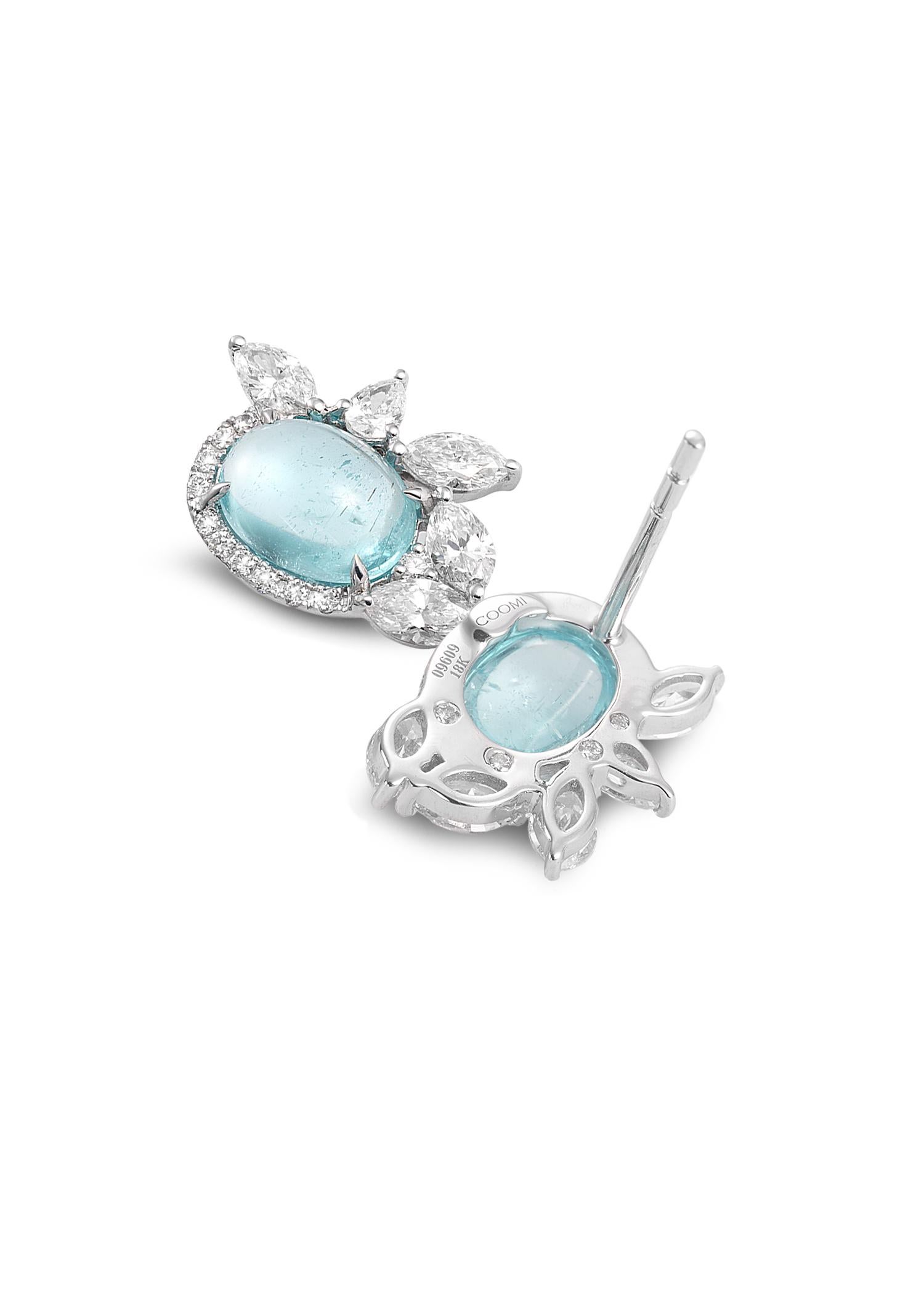 Trinity Collection, 18K white gold with 2.72CT cab oval Paraiba with 1.15cts diamonds. 
