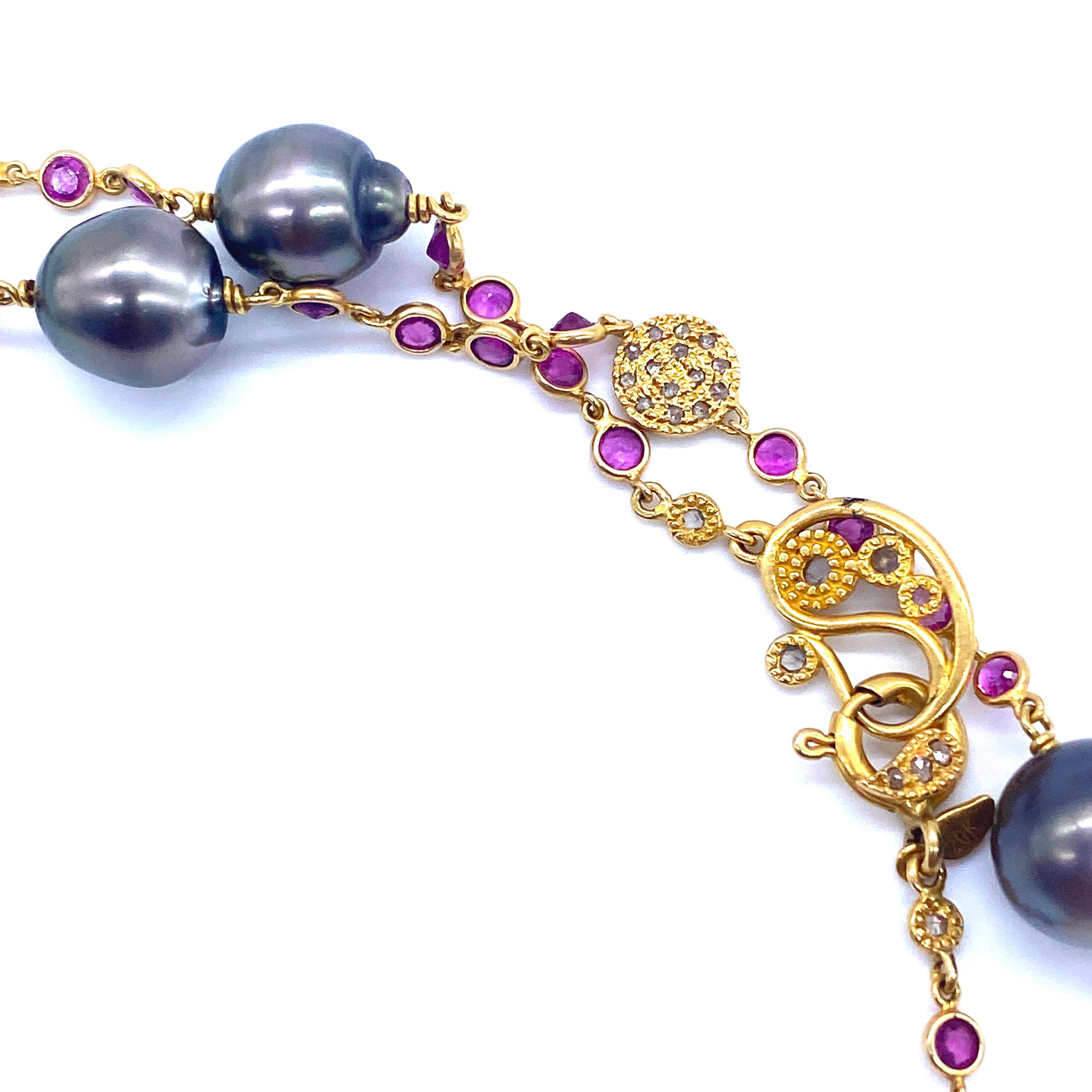 COOMI South Sea Pearl, Pink Sapphire and Diamond Necklace 34 inches long. South Sea Pearls Range in size from 10-12mm. 12.32cts of pink sapphires and 1.31cts of diamonds. Necklace has a lobster clasp and can be doubled.