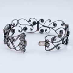 Bracelet jonc Coomi Vitality en or noir 20 carats et diamants