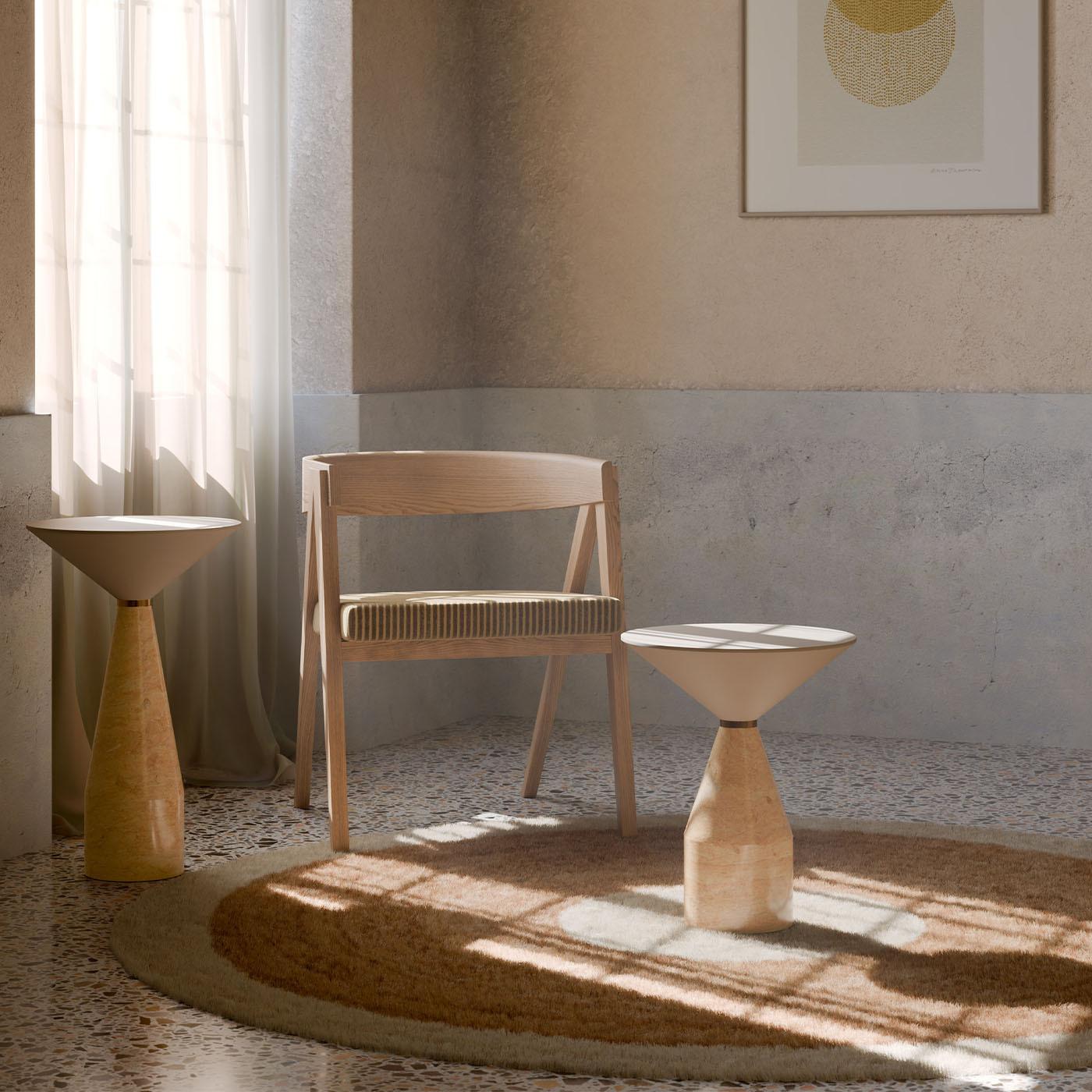Crafted from high-quality ash wood, the Cooper Chair exemplifies elegant design and comfort. Featuring a uniquely curved backrest, this chair not only enhances support but also adds a touch of sophisticated style to any space. The seat is