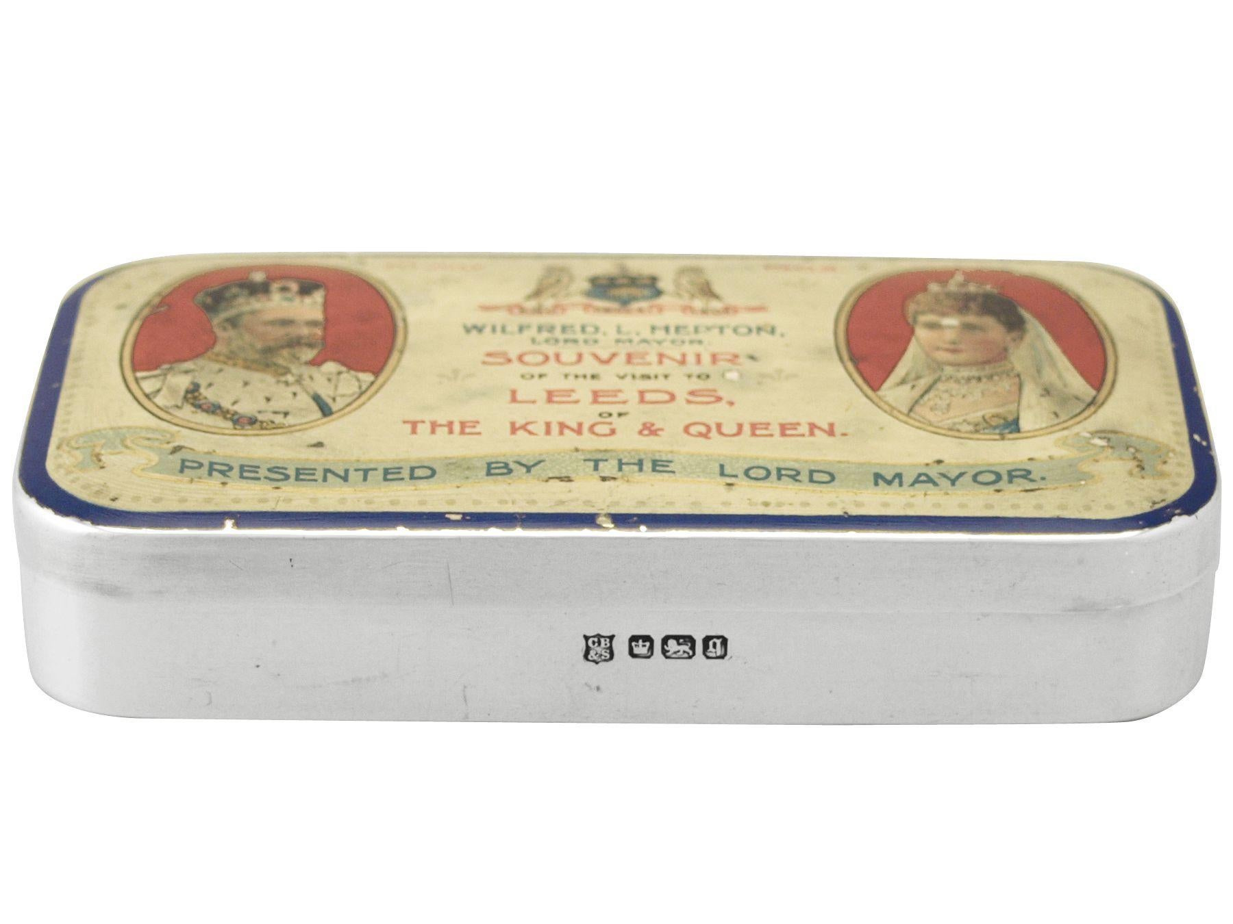 A fine and impressive, unusual antique Edwardian English sterling silver commemorative box; an addition to the ornamental silverware collection.

This fine antique Edwardian sterling silver commemorative box has a plain rectangular form with rounded