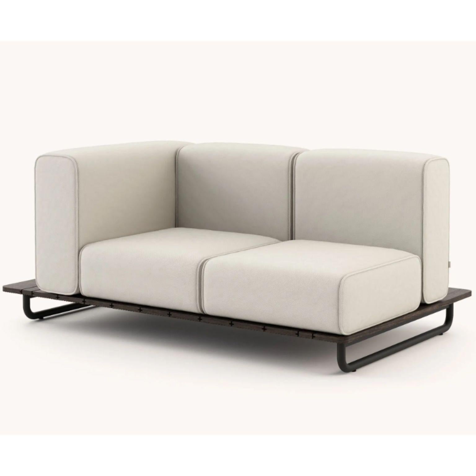 Copacabana sofa with 1 arm right by Domkapa
Materials: black texturized steel, bamboo wood, fabric (Rhine Ice).
Dimensions: W 165 x D 105 x H 75 cm.
Also available in different materials. 

Copacabana sofa with or without armrest is an
