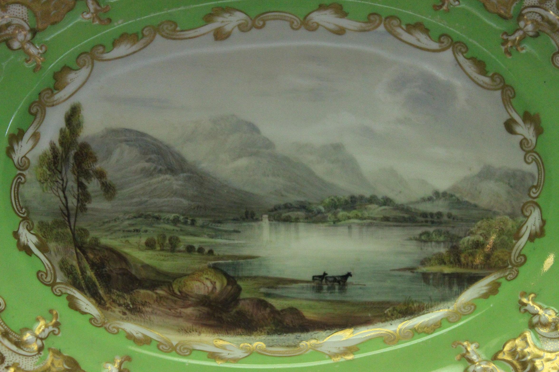 This Copeland & Garrett hand painted bowl features a central scene of Loch Achray by the Copeland and Garret artist/gilder Mansfield, which is surrounded by an apple green ground. Mansfield was at Copeland and Garrett from around 1849 to 1860. The
