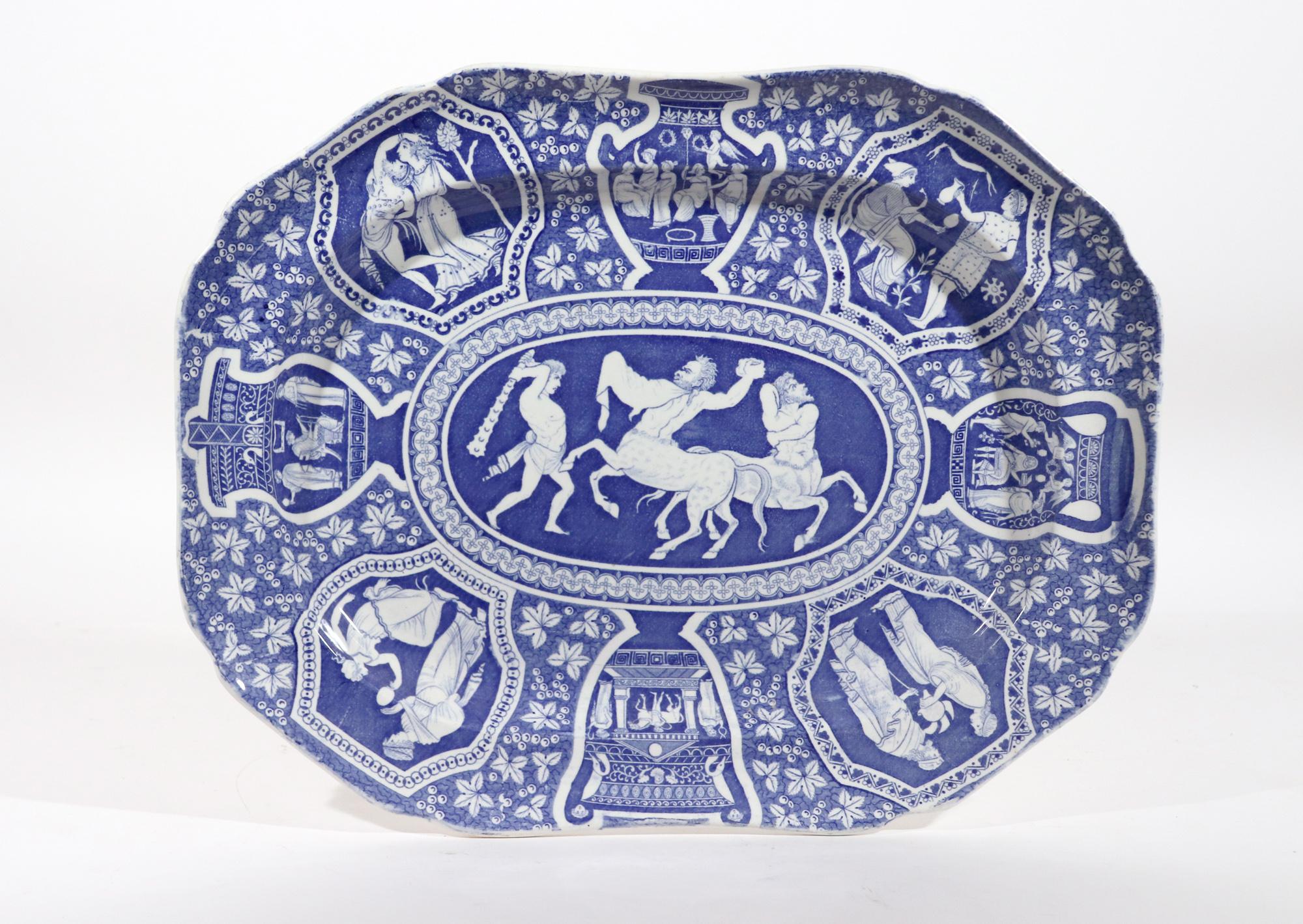 Copeland & Garrett Pottery neo-classical Greek Pattern blue dish,
Centaurs Battling Theseus,
1833-47

The Spode Greek pattern pottery, shaped rectangular dish with cantered corners is printed in blue with neo-classical scenes on panels and urns