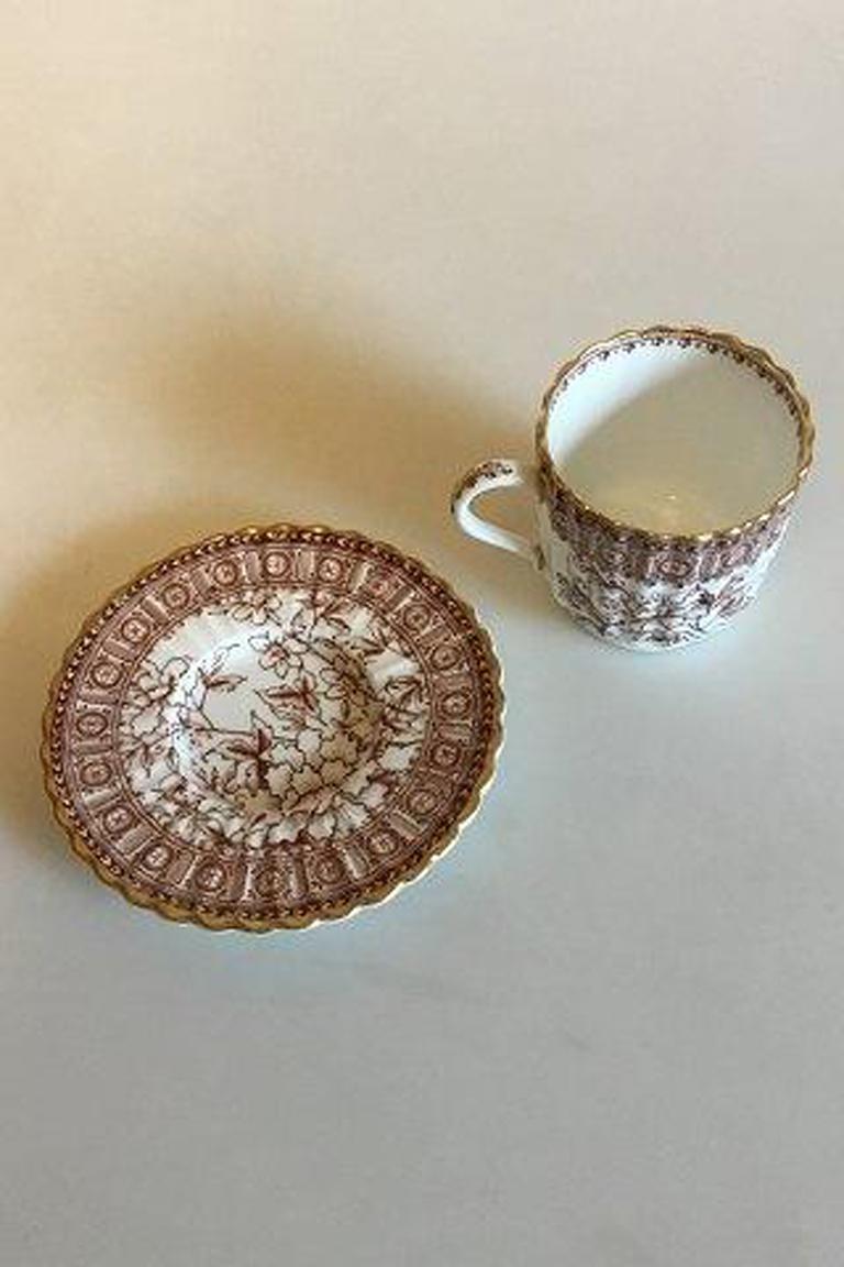 Copeland Porcelain with gold mocca cup and saucer. 

Measures 5.5 cm / 2 11/64 in. x 5.4 cm / 2 1/8 in. diameter. Saucer: 10 cm 3 15/16 in. diameter.