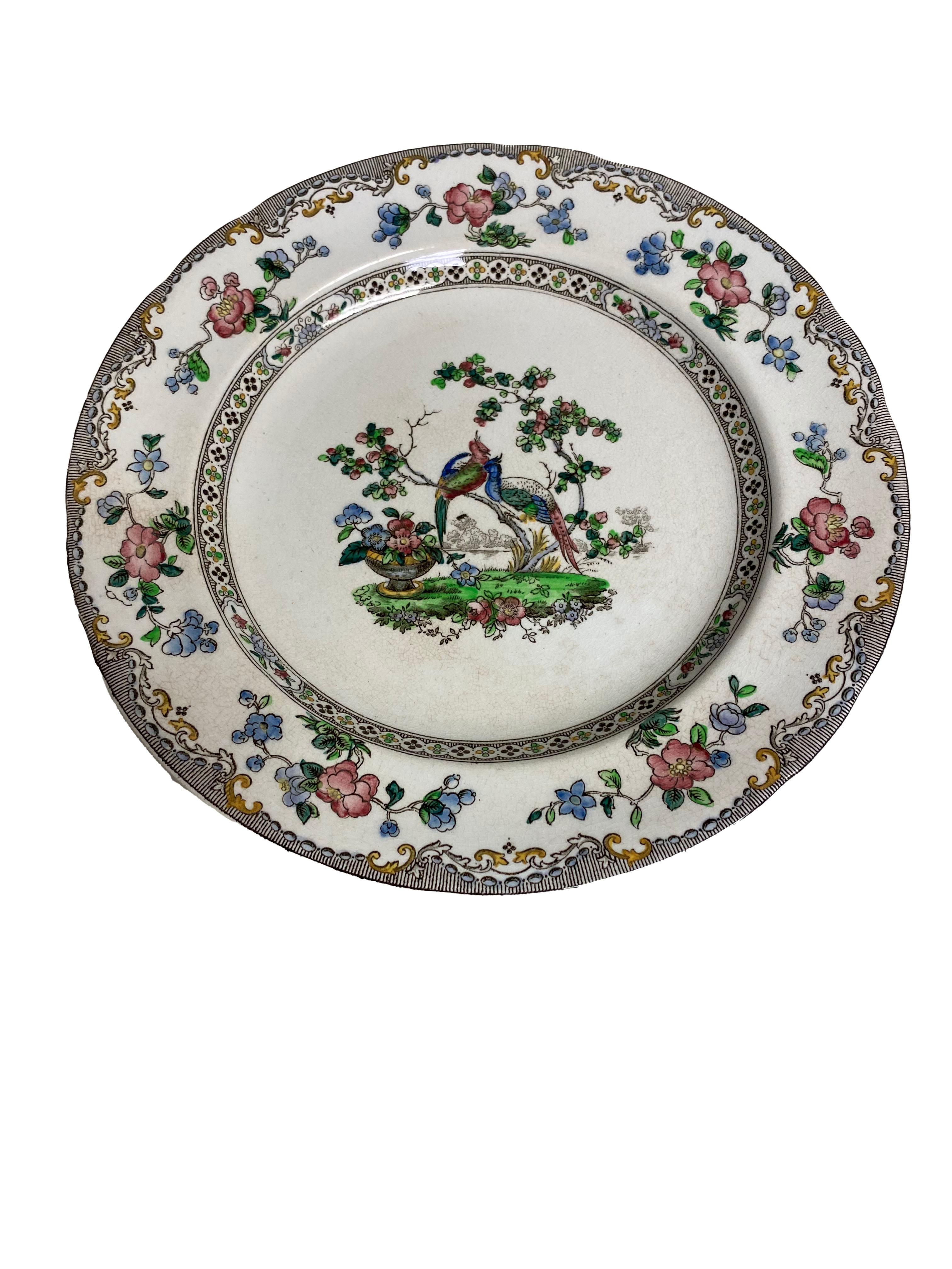 A wonderful pair of early Copeland Spode Bridal Veil chinoiserie plates featuring two pheasants on a branch. Each with registration number 615911. These were made exclusively for F Gorringe Ltd of Buckingham Palace Rd, London. circa 1913, England.
