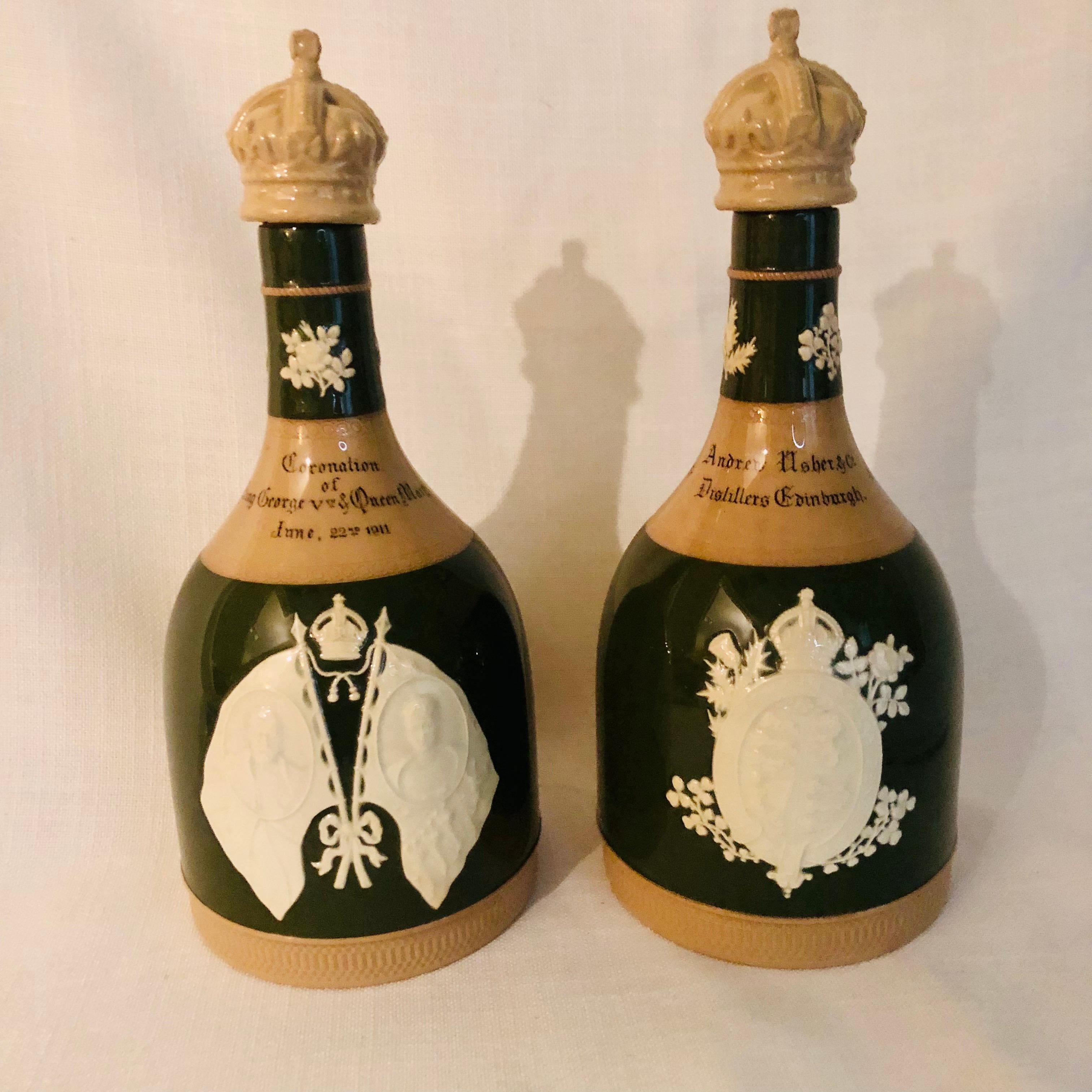 This is a wonderful rare pair of Copeland Spode decanters commemorating the coronation of Queen Mary and Prince Charles the 5th on June 22, 1911. On one side of the decanters are two medallions depicting Queen Mary and Prince Charles the 5th. The