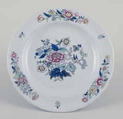 Copeland/Spode, England. Nine plates in faience. With floral and bird motifs.
