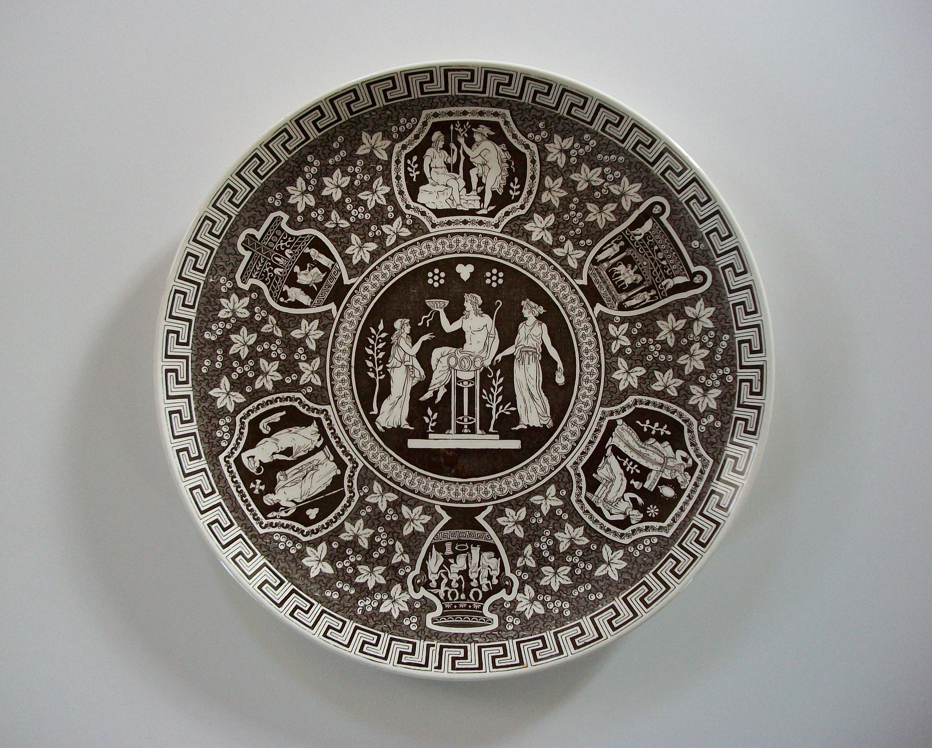COPELAND SPODE - Greek Revival transfer decorated ceramic cabinet plate in brown - featuring panels of Greek Gods and antique urns within a Greek key border - signed on the back (back stamp, impressed mark and date letter/number) - United Kingdom -