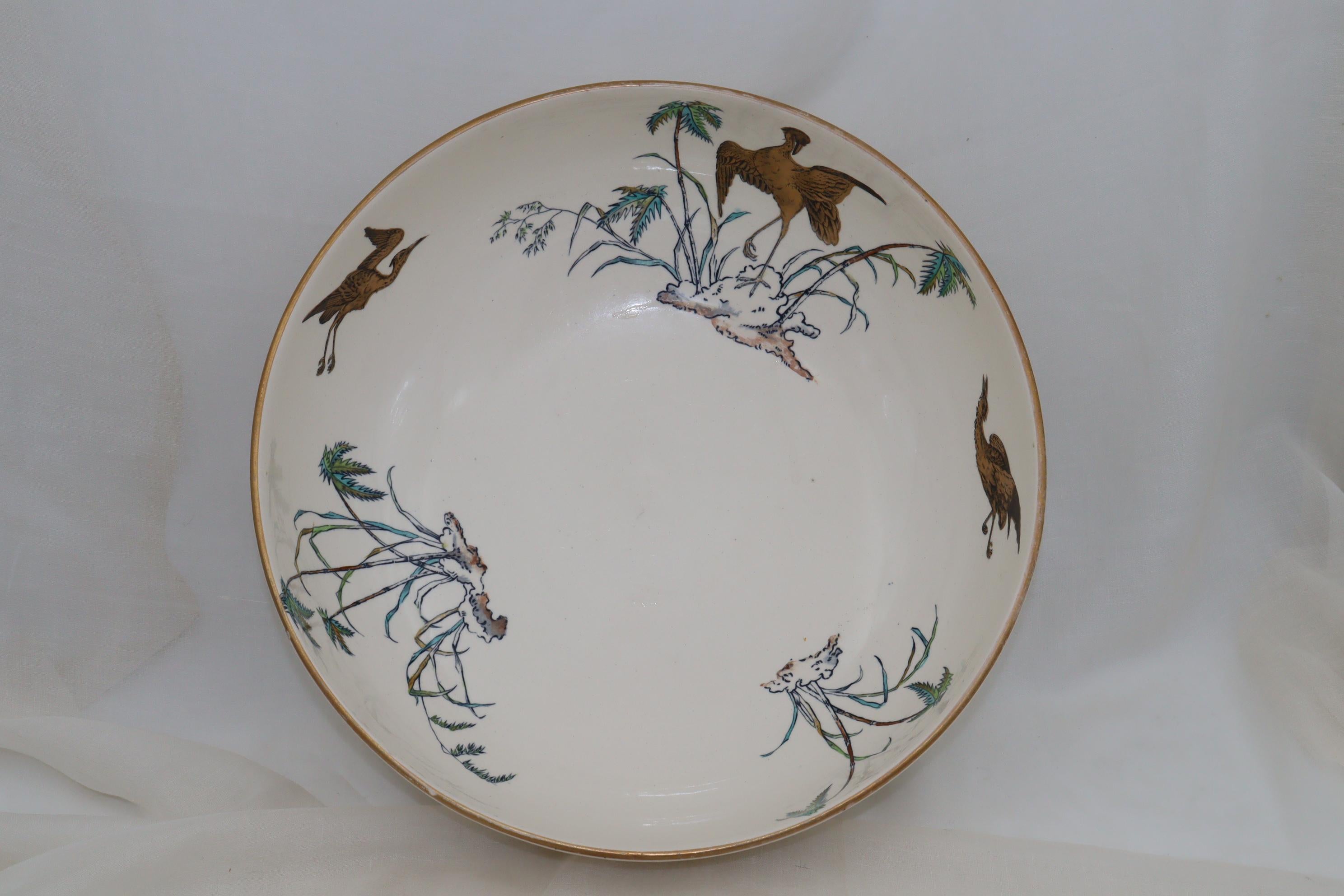 This Copeland Spode wash jug & basin set is decorated in a pseudo Japanese style made popular after Japan was opened up to the West from the late 1850's. Japanese art was wildly popular from the 1860's onwards and its influence was felt for many