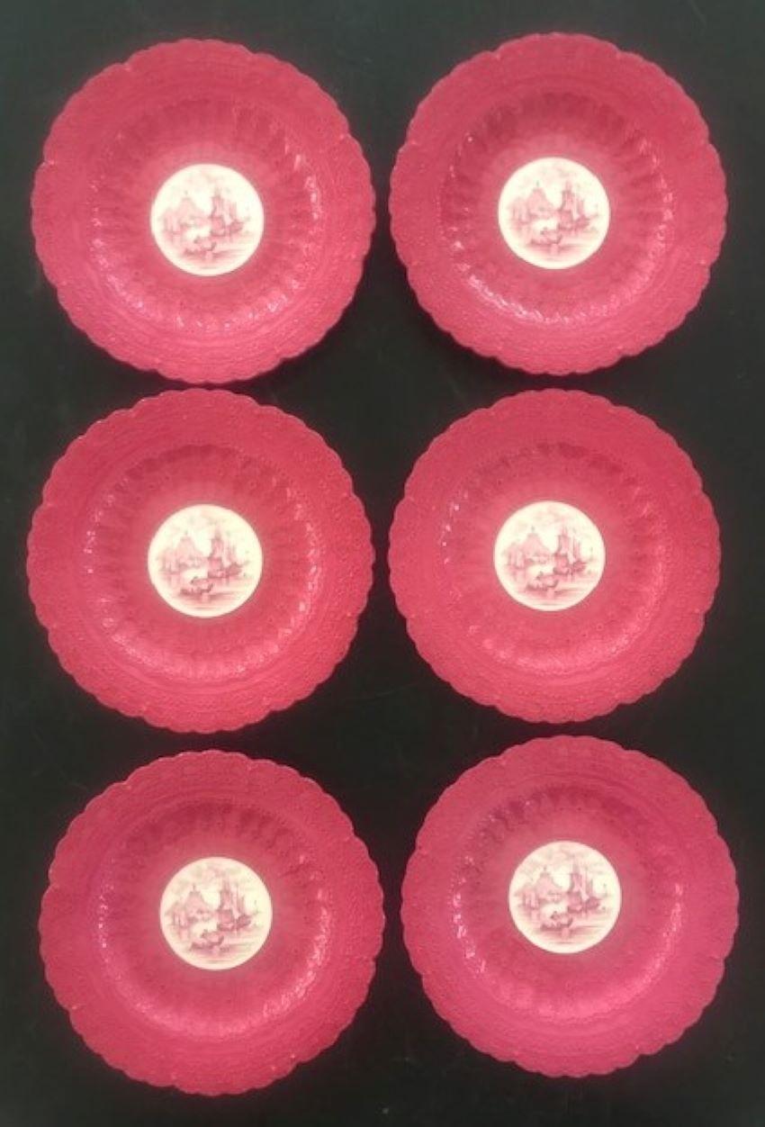 Copeland Spode luncheon plates in the Spode's Jewel pattern, the plate is in a pink lace design with the center a bucolic scene of a couple boating.

The bottom is stamped: 
Spode's Jewel, Copeland, Spode, England Reg #70392, US Pat. June 15,