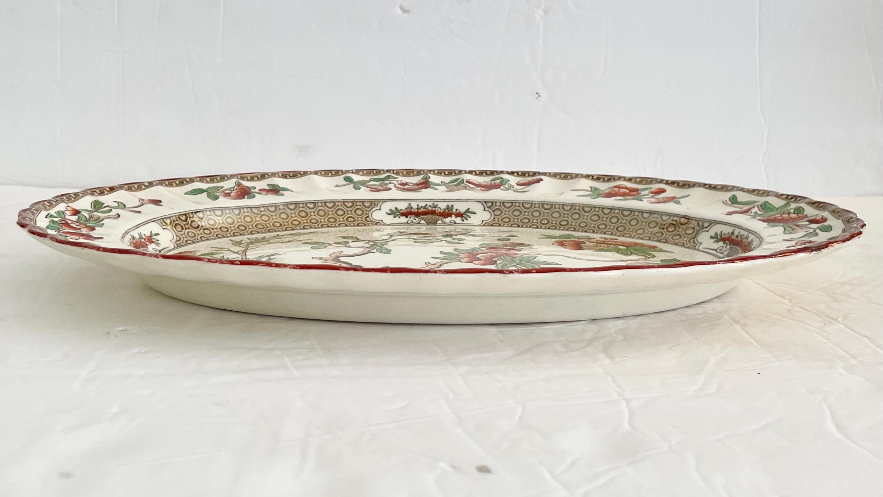 Fabulous oval porcelain serving platter from the English makers Copeland Spode. Beautiful design and colors. See our collection of Copeland Spode and other fine serveware in our listings.