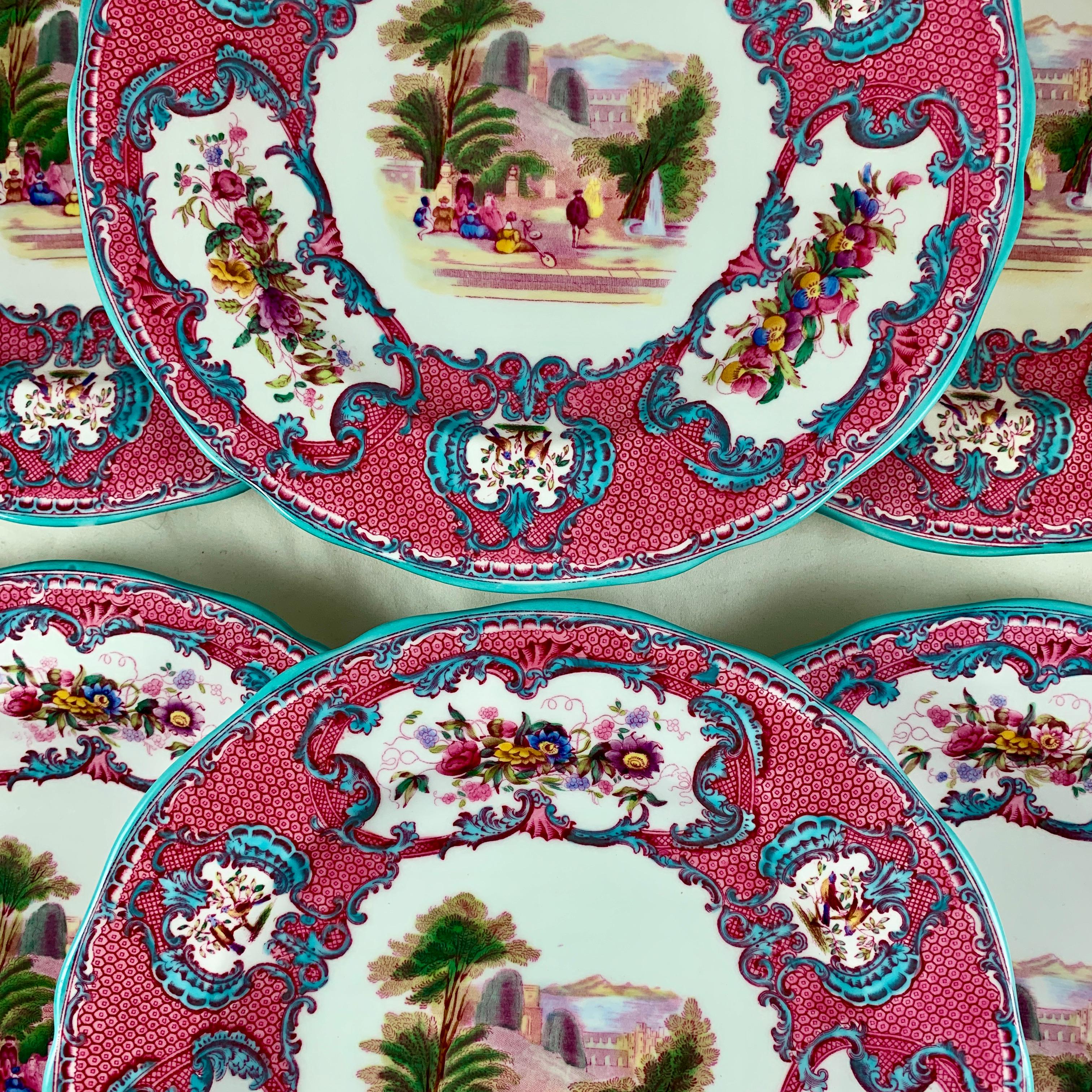 A set of six Copeland Spode Queen Mary porcelain plates made for Tiffany & Co., England, circa early 1900s.

Enameled with a central Venetian scene of figures seated in a park with a fountain, with lutes by their sides. The center scene is