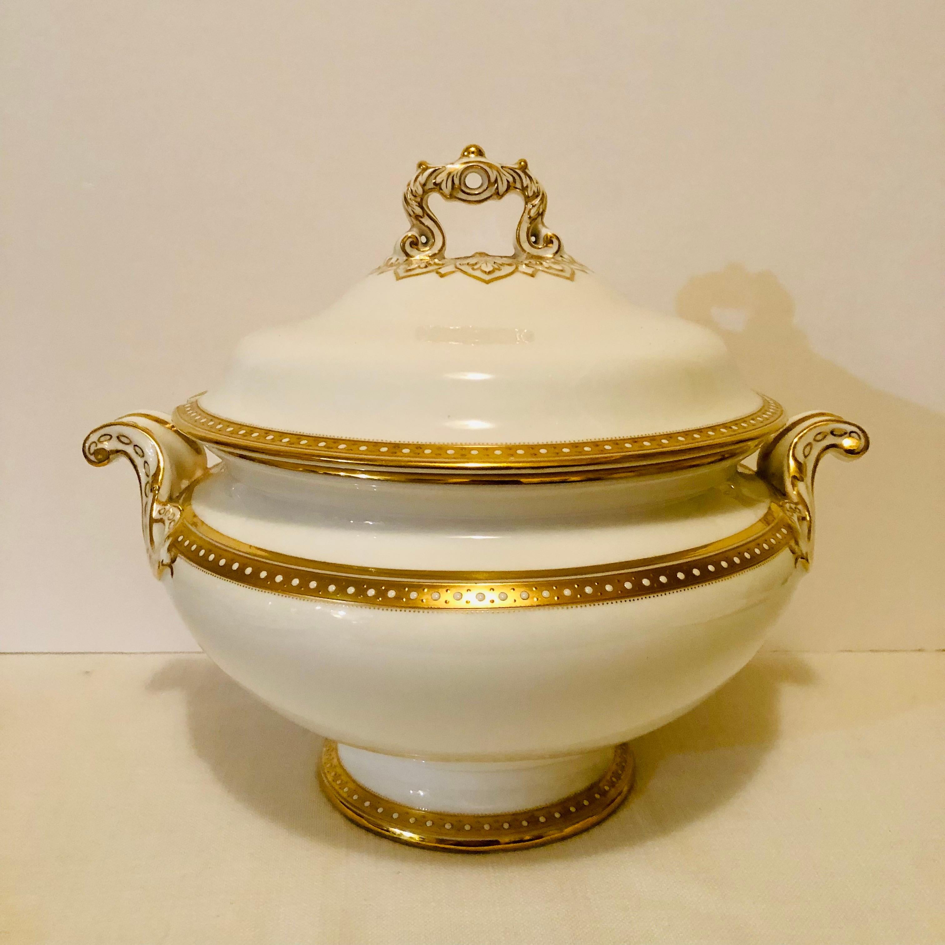 Exquisite Spode Copeland soup tureen with gold borders and white enamel jeweling on a white porcelain body. This gorgeous large soup tureen exemplifies simple elegance, and it would look wonderful with any dinner service. Look at the picture of the