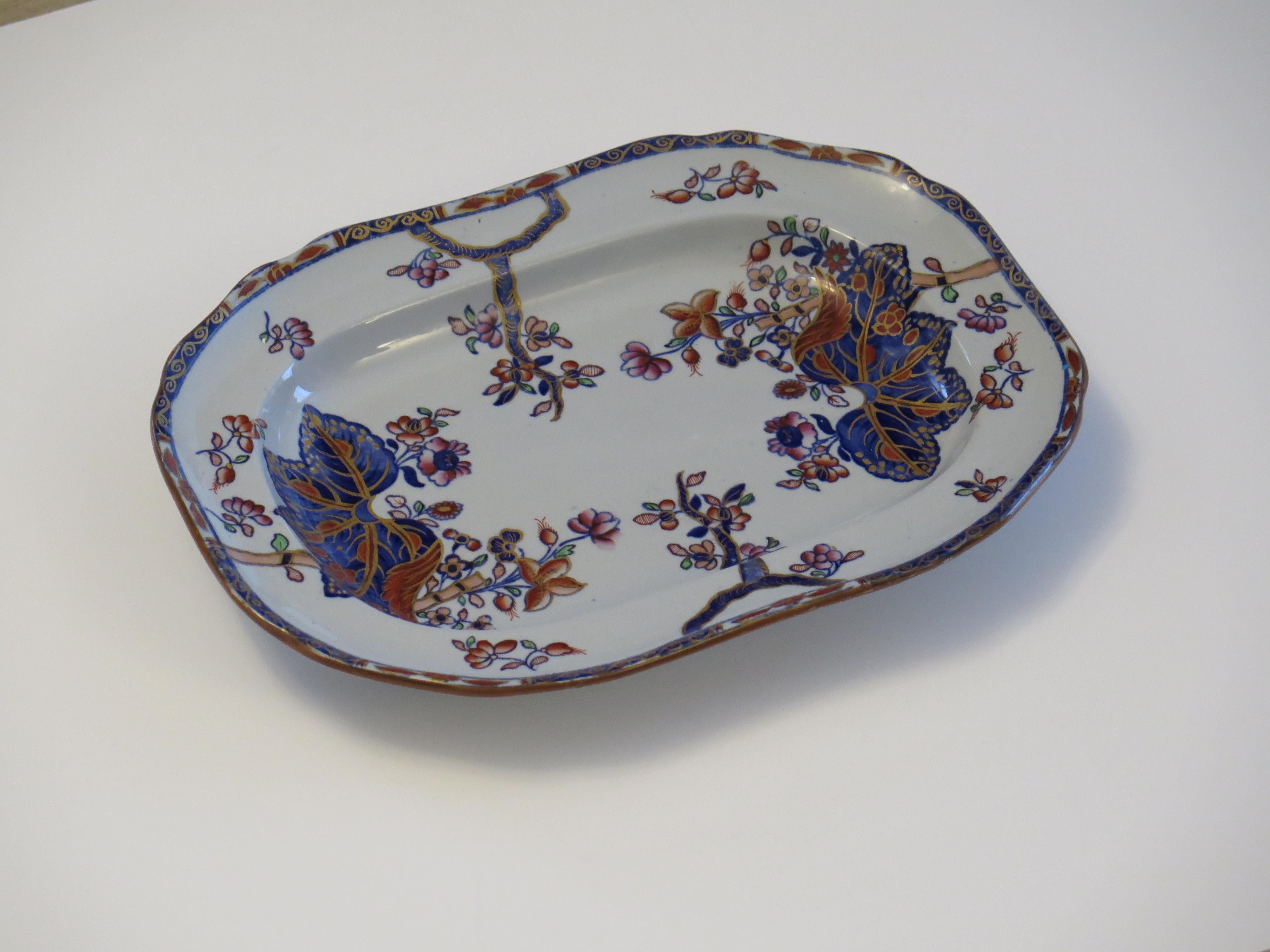 This is a good antique stone China (Ironstone)  Serving Dish or Platter, in the hand - painted Tobacco Leaf pattern number 2061, made by the Copeland Late Spode factory during the mid 19th century.

The platter or Dish is well potted, fairly deep,