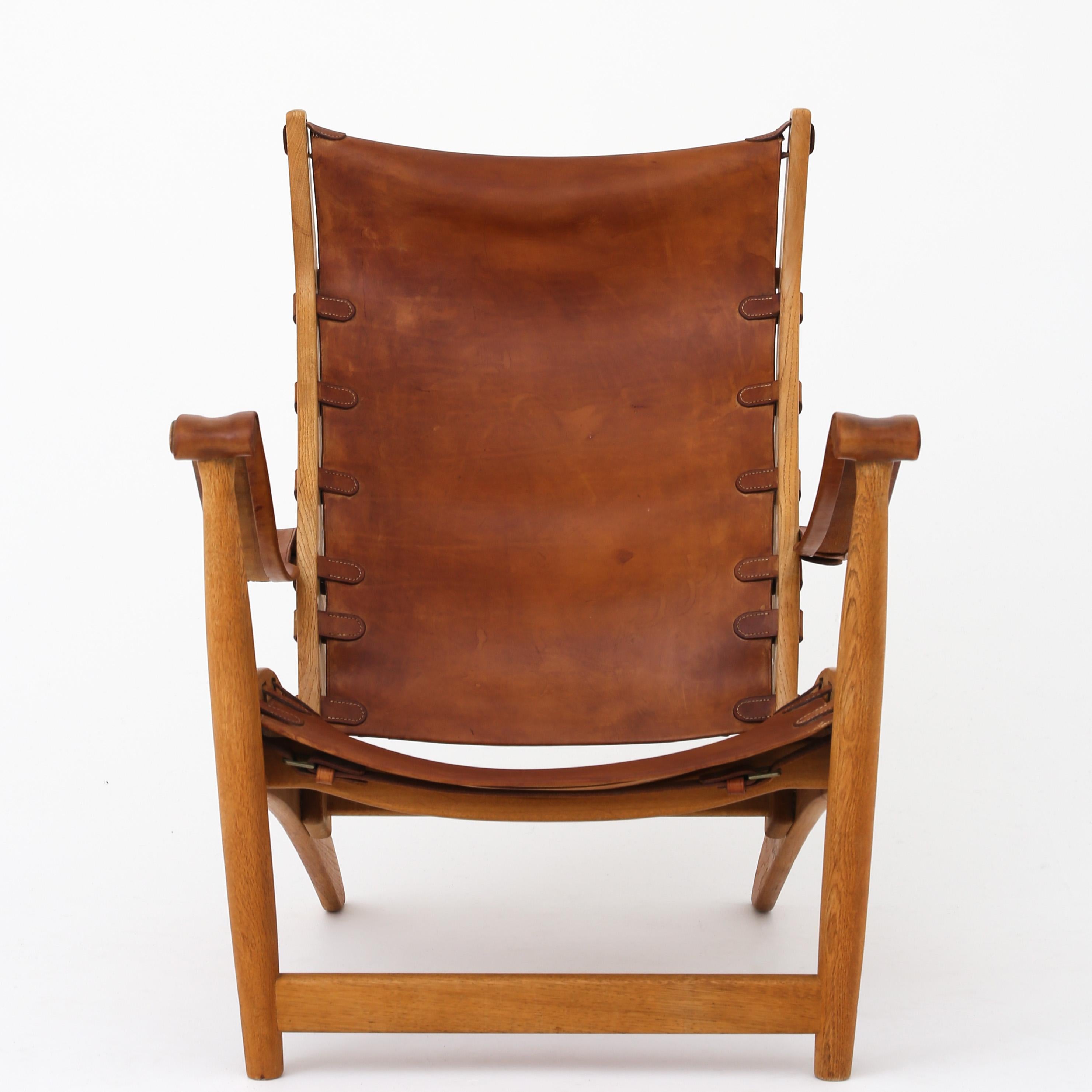 Mogens Voltelen and Niels Vodder. 'Copenhagen Chair II' in patinated leather and oak. Designed in 1936.