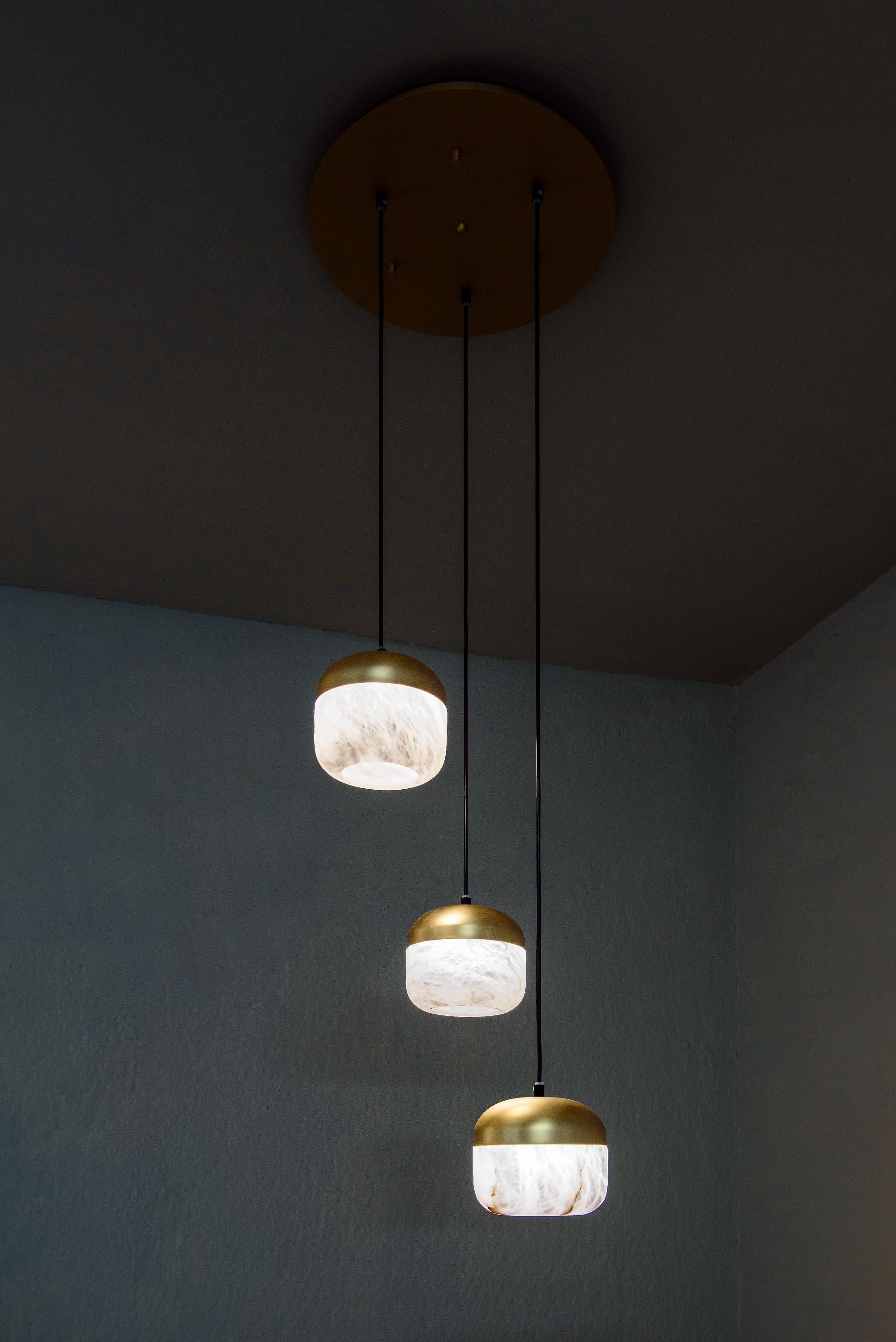 Copper 3 Pendant Lamp by United Alabaster
Dimensions: D 60 x H 180 cm
Materials: Alabaster, Copper (Satin Gold Finish)
Also Available: Black Nickel, Satin Copper finishes.

All our lamps can be wired according to each country. If sold to the USA it