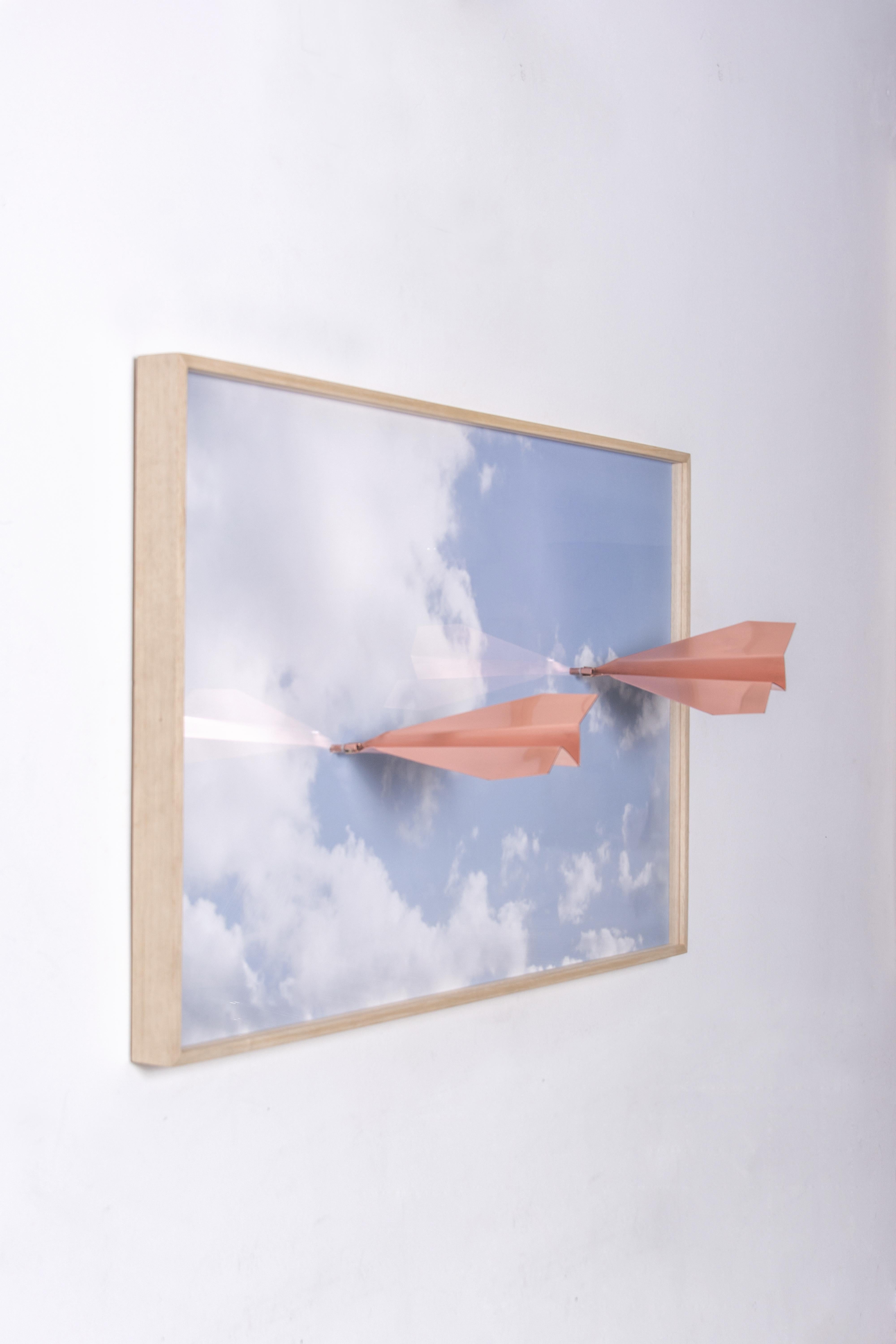 Metal airplane. On the frame picture frame - Limited edition of 10 unities 
Material: Printed photo on a cotton paper, acrylic glass with planes attached on it 
Dimensions: 80 x 50 x 27 cm 
Copper or brass airplane 
Limited edition - 10 pieces.