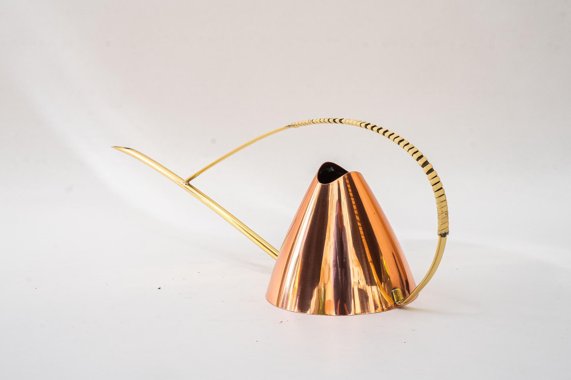 Copper and brass conbination watering can vienna around 1950s
Brass and copper polished and stove enameled
