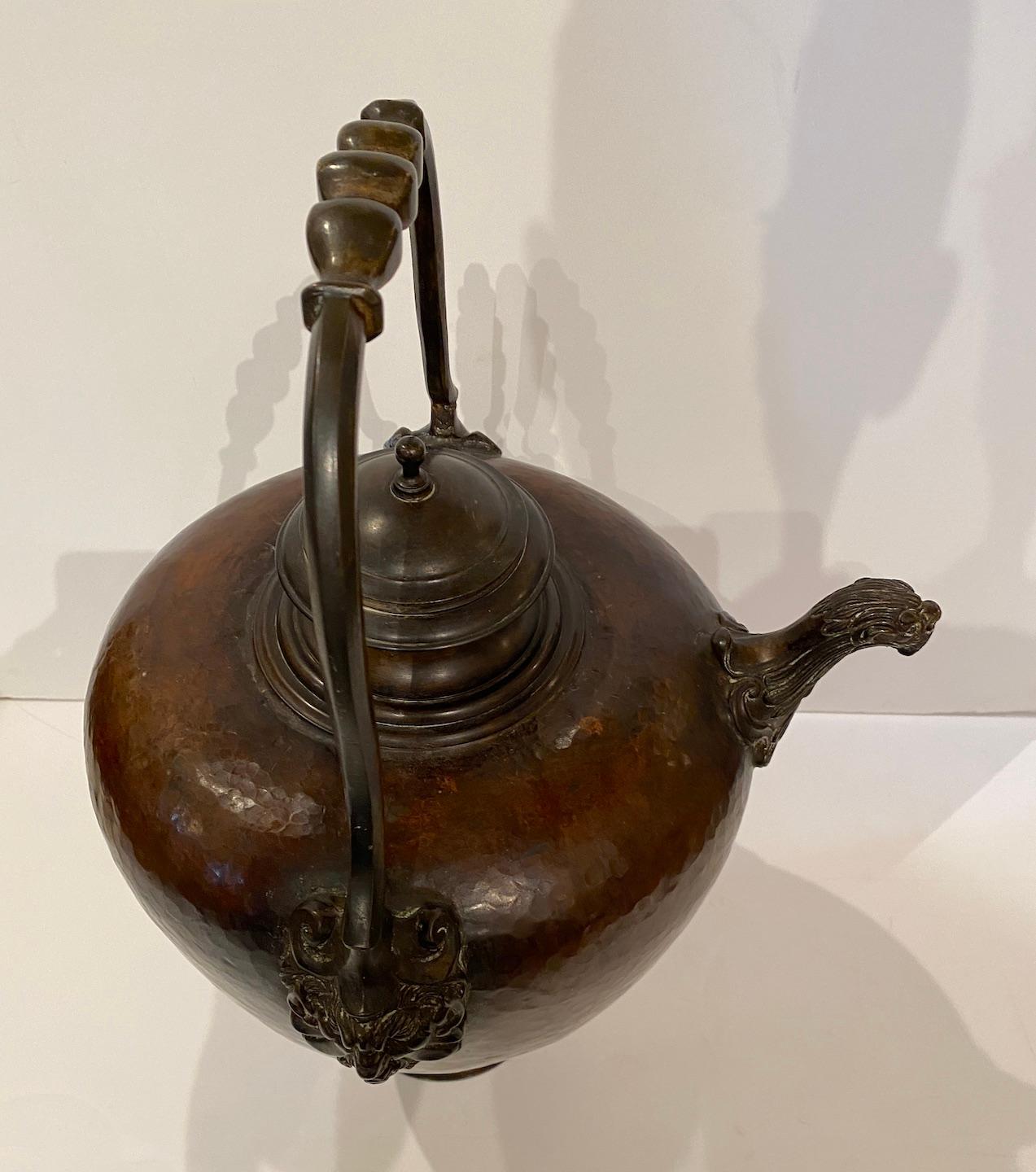 Hand pounded copper ewer with bronze spout, handle and top. From the area of Florence, Italy, circa 1800.