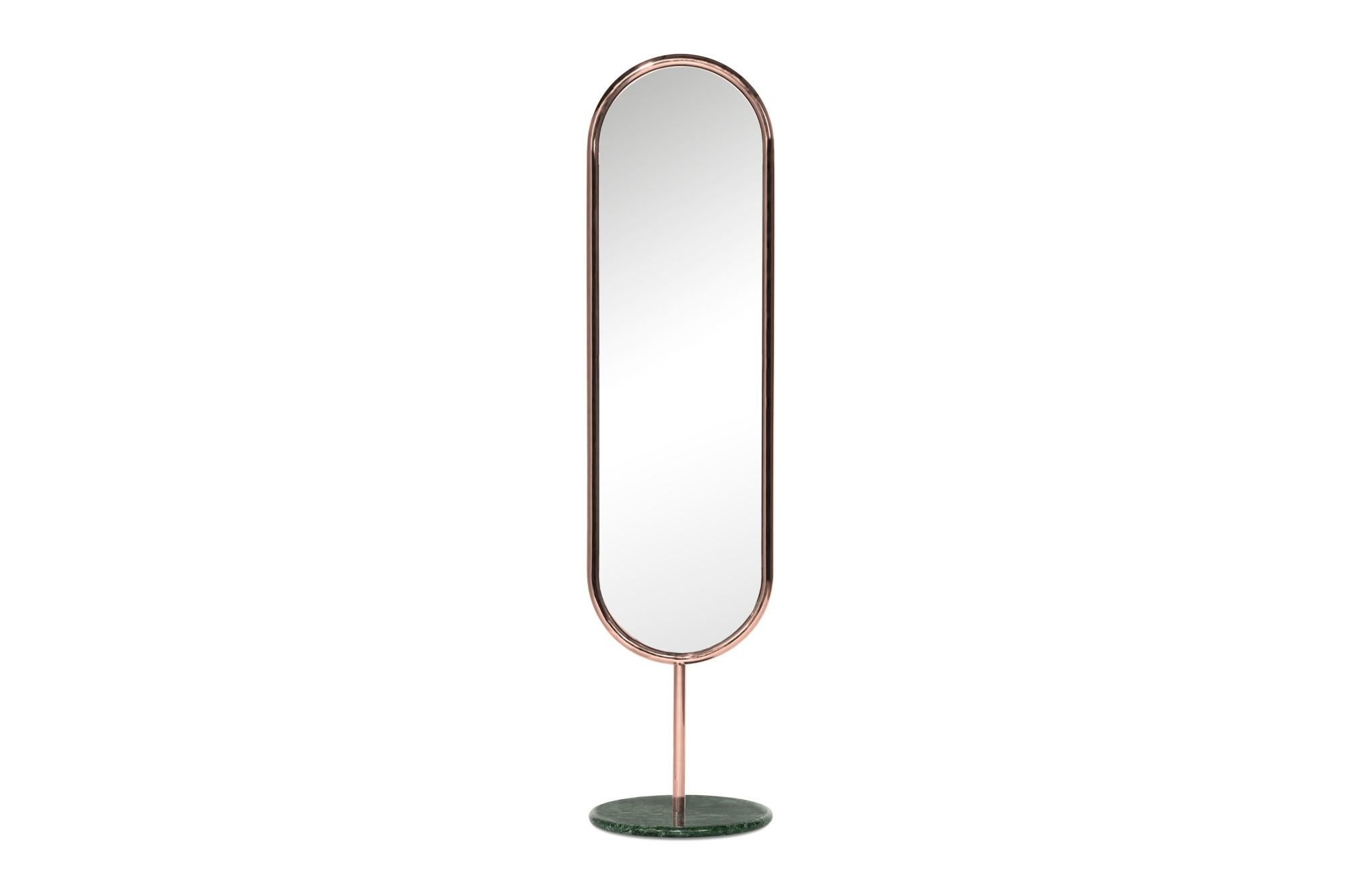 Copper and green marble marshmallow floor mirror, Royal Stranger
Dimensions: 183 x 44 x 44 cm
Materials: Polished brass structure standing on the top of a Guatemala Green marble.

Available in brass, stainless steel, and copper with polished or