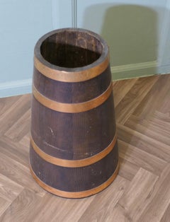 Copper and Oak Barrel Stick Stand  This  good looking piece is cone shaped