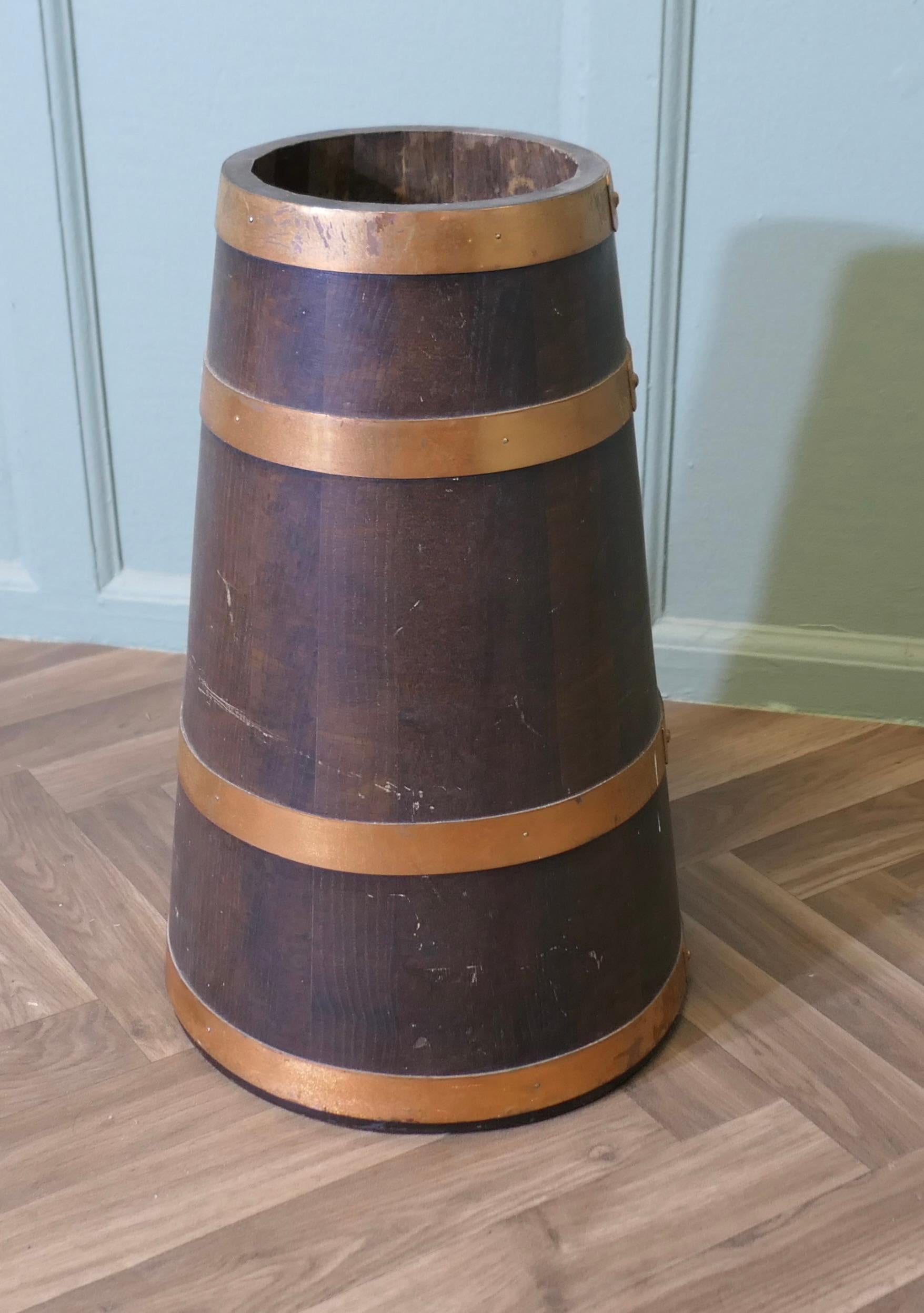 Country Copper and Oak Barrel Stick Stand  This  good looking piece is cone shaped For Sale