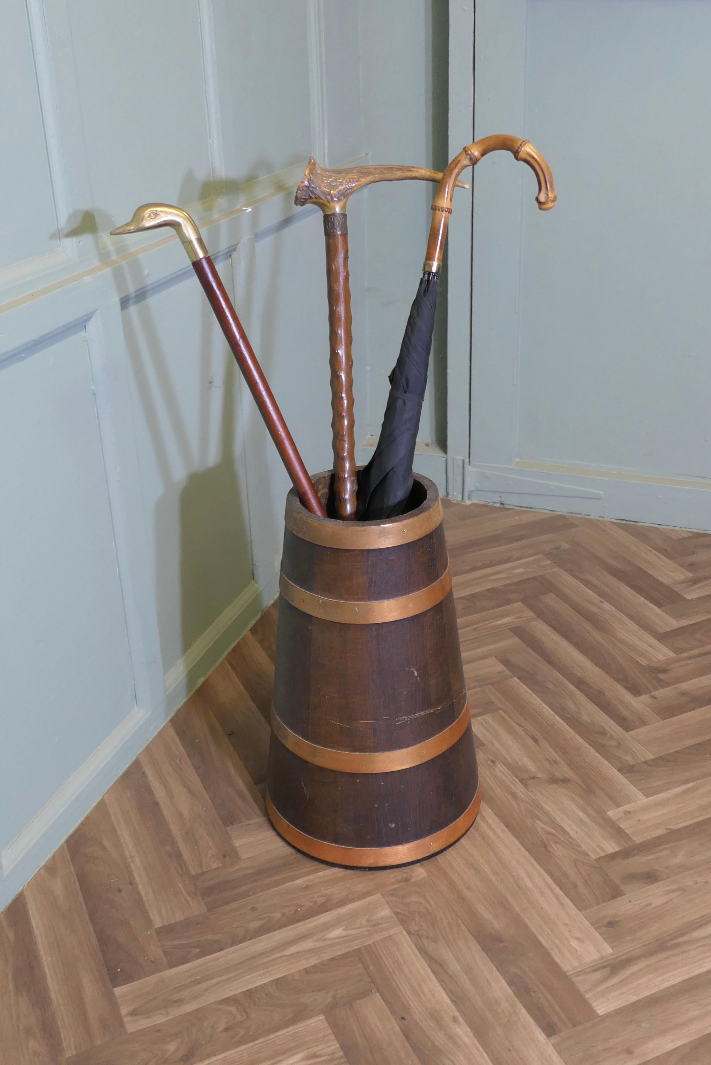 Copper and Oak Barrel Stick Stand  This  good looking piece is cone shaped For Sale 1