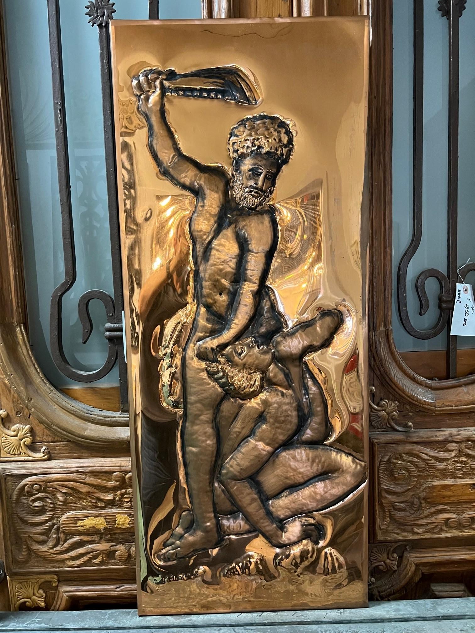 Late 20th century hand hammered copper panel of Samson slaying a Philistine signed and dated. Inspired by the famous marble sculpture by Giambologna of Samson who used a jawbone of an ass to slay one of the Philistines who have taunted him. It is in